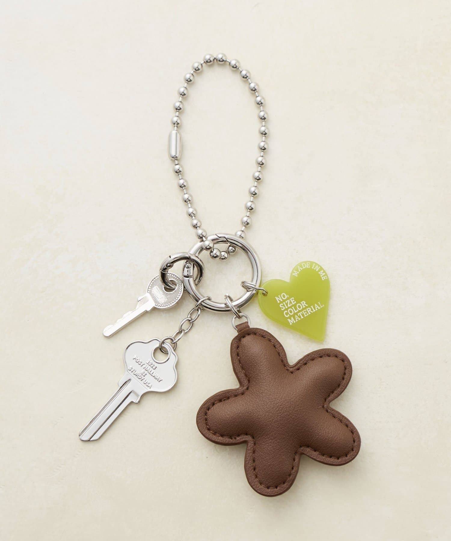 DISCOAT(ディスコート) 【GOLDY】レザー調フラワーキーチャーム