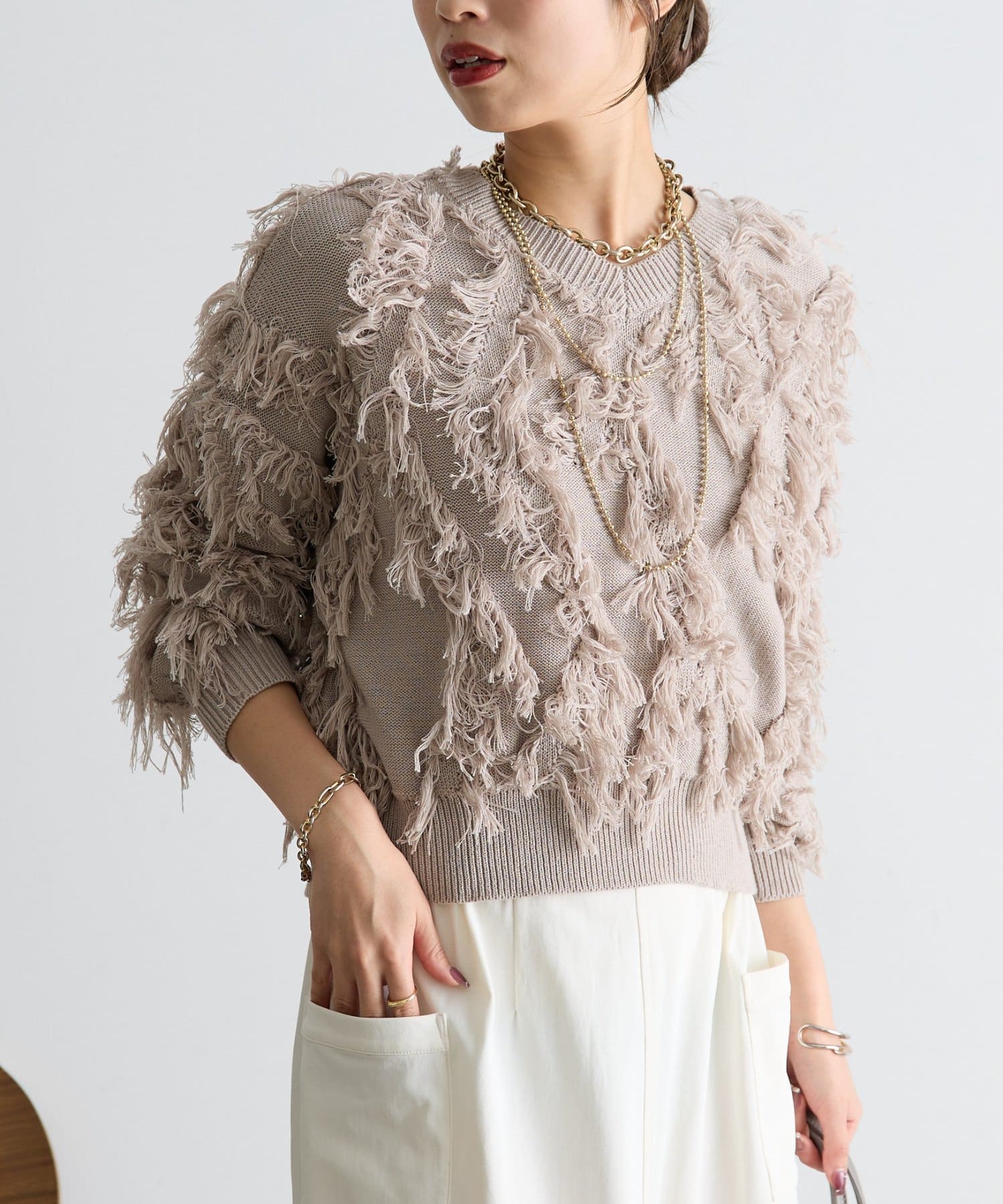 Jena　espace merveilleux(ジェナ　エスパスメルヴェイユ) フリンジVニット