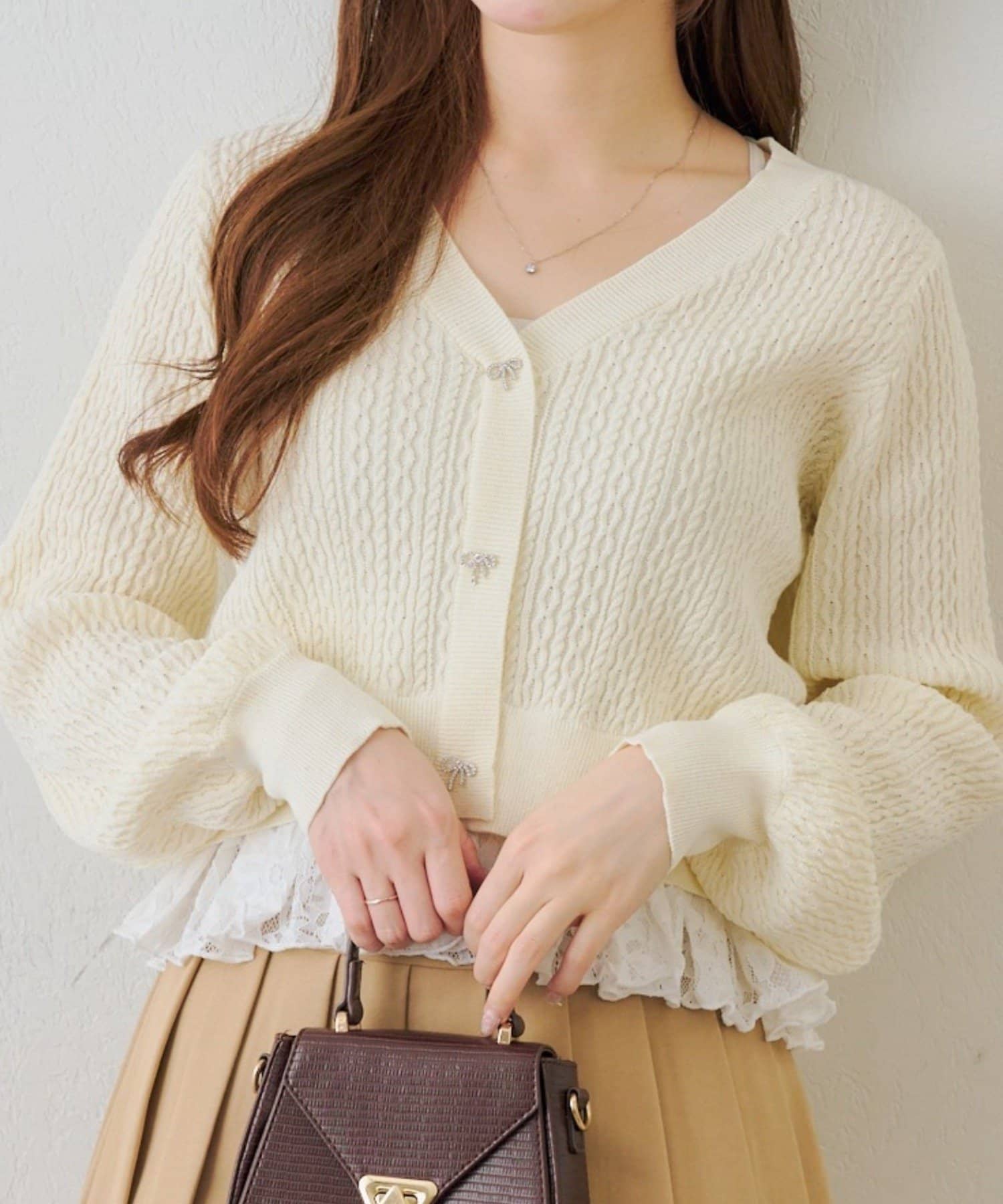 Remind me and forever(リマインドミーアンドフォーエバー) 裾レースリボン釦カーディガン