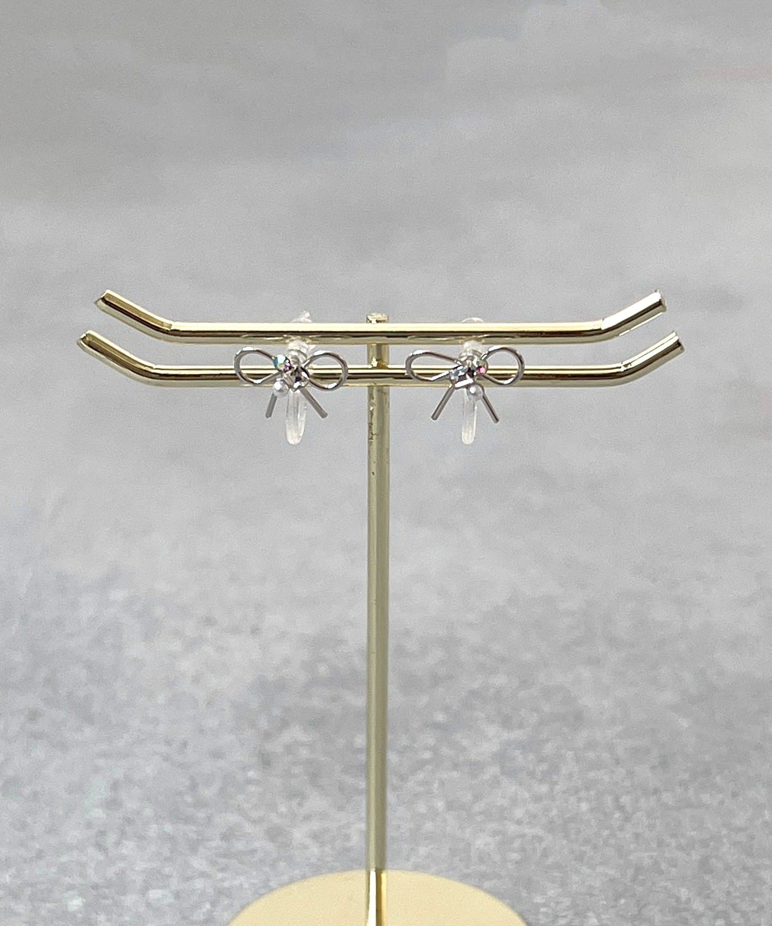 3COINS(スリーコインズ) センターパーツリボン樹脂イヤリング