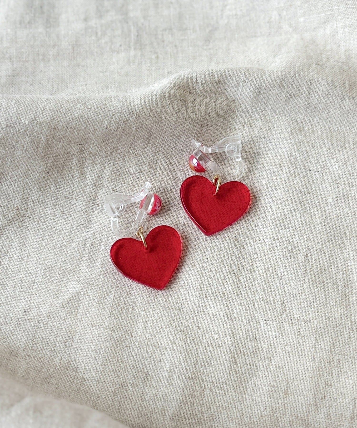 3COINS(スリーコインズ) クリアハートイヤリング／KIDS