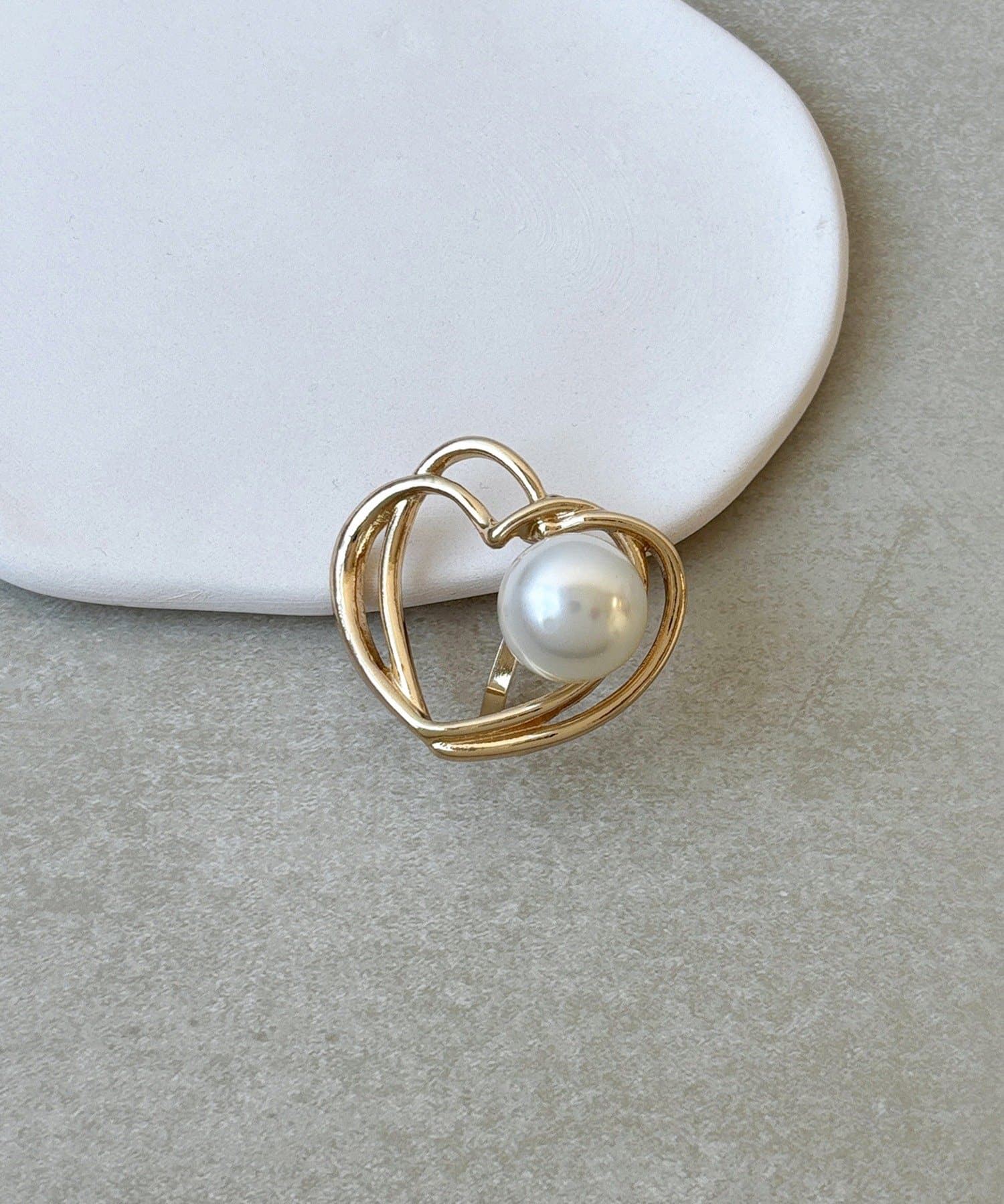 3COINS(スリーコインズ) パールラインハートフックポニー