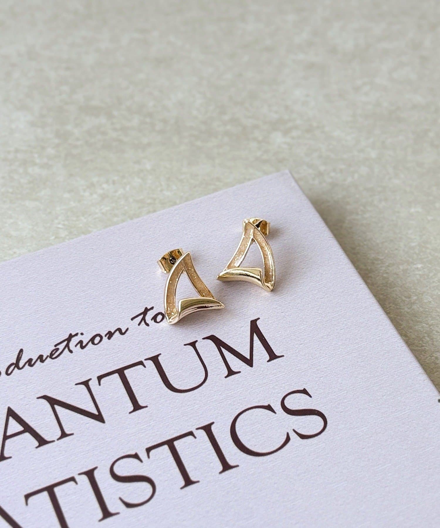 3COINS(スリーコインズ) ラメエポトライアングルピアス