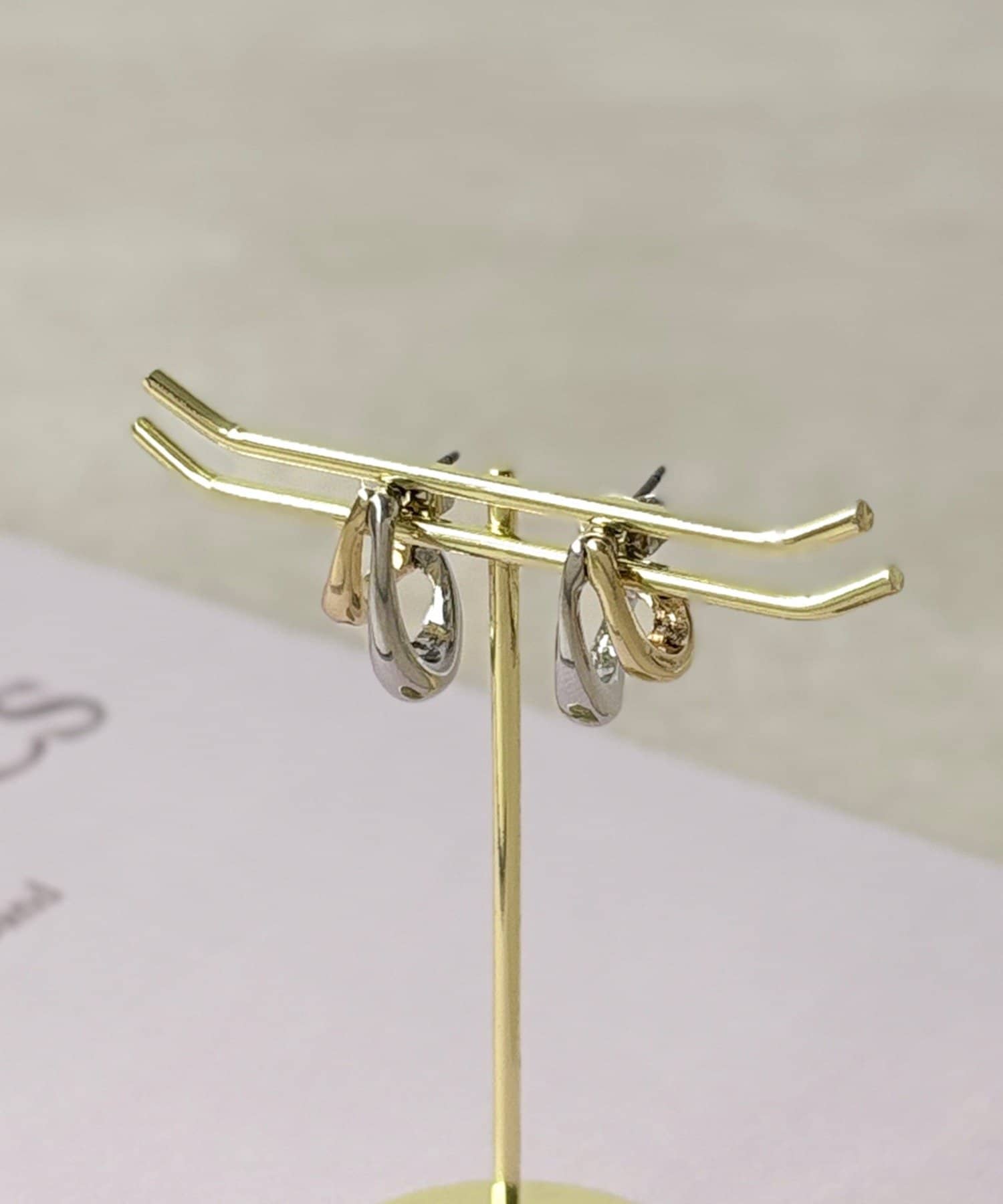 3COINS(スリーコインズ) ツートーンカーブピアス