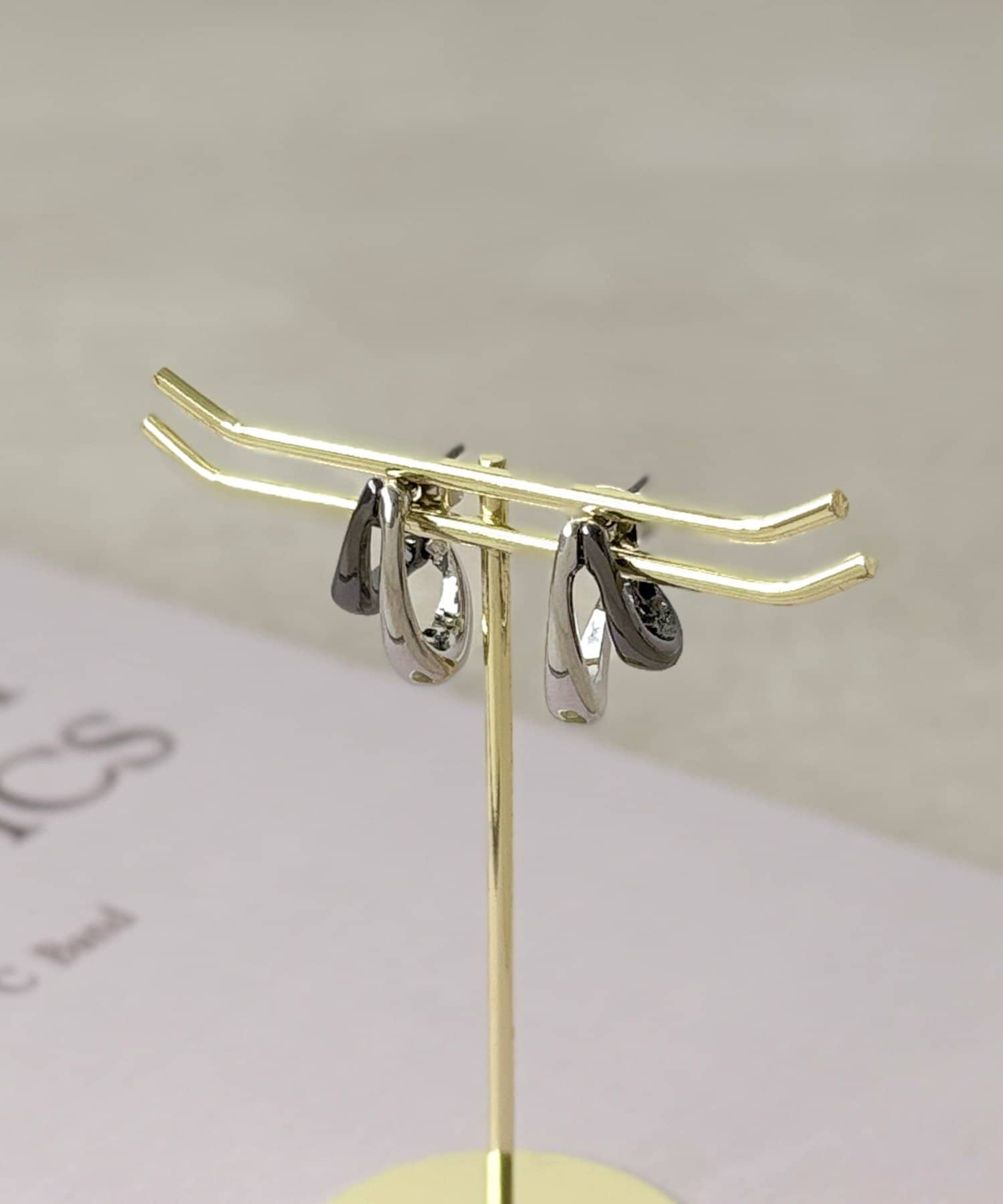 3COINS(スリーコインズ) ツートーンカーブピアス