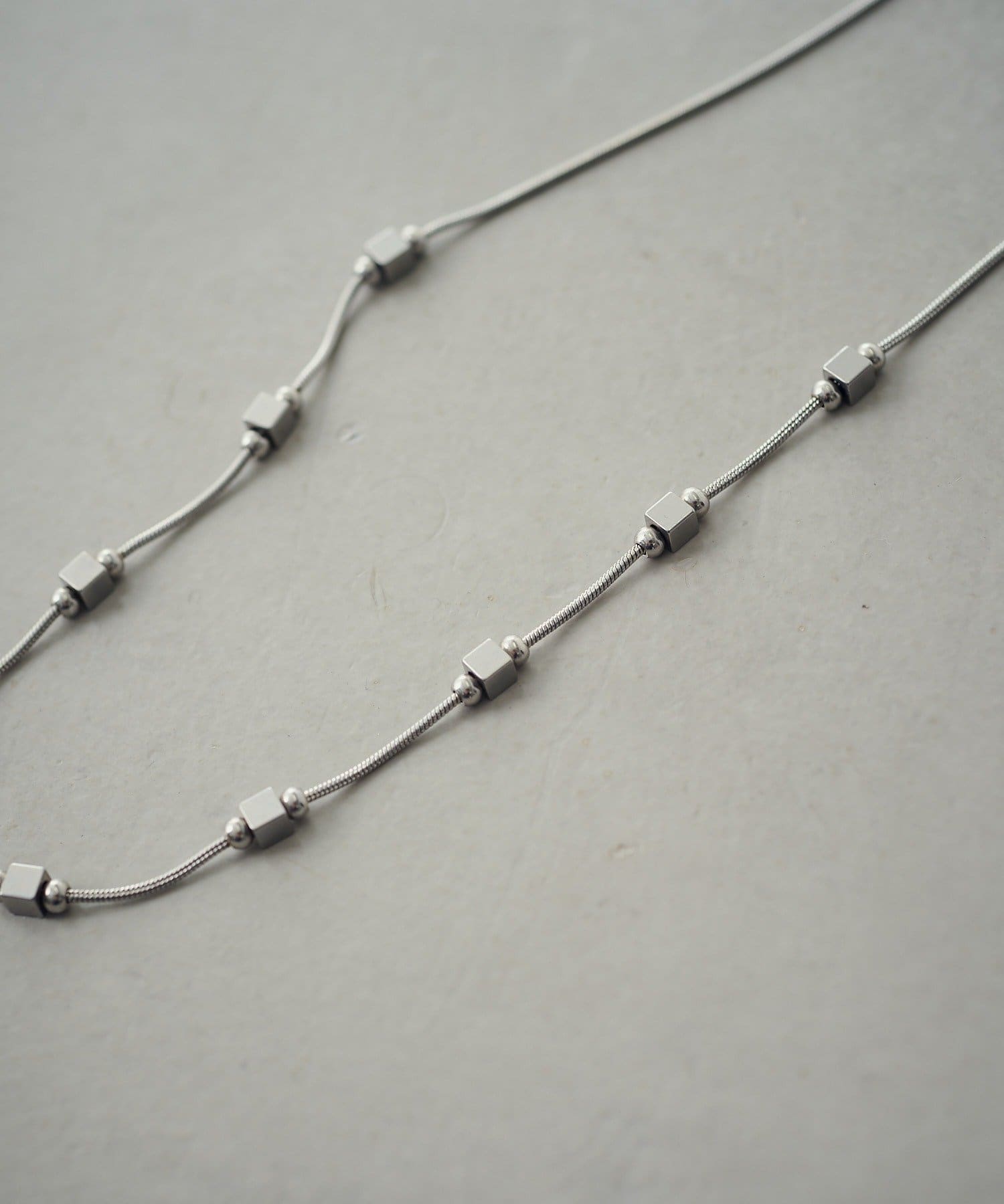 -goocy-(グーシー) 【ステンレス】スキップポイントネックレス