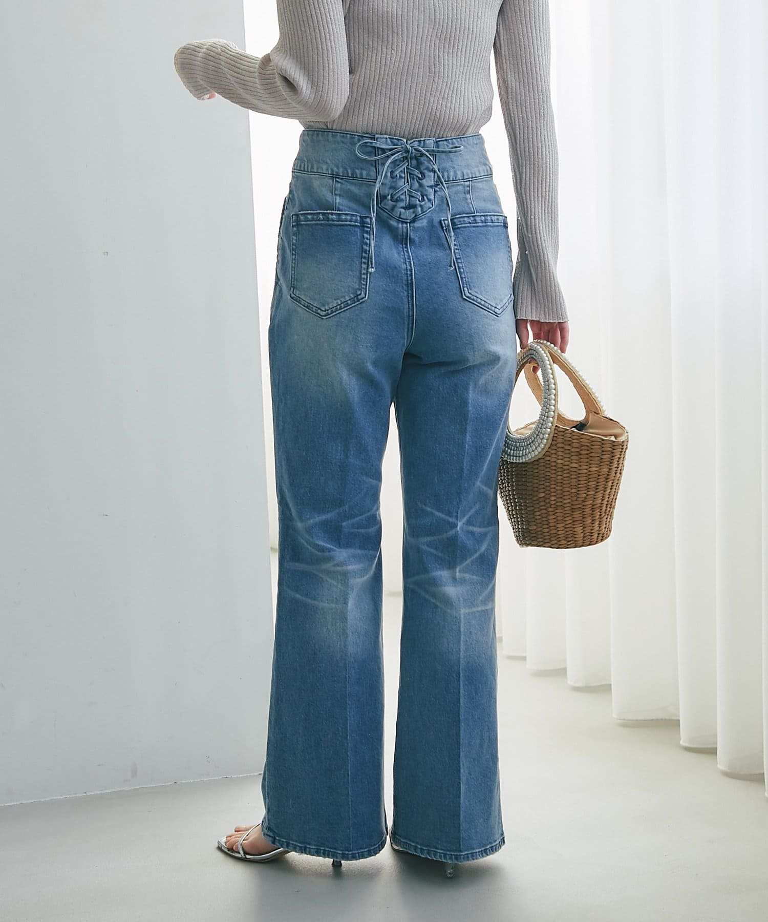 La boutique BonBon(ラブティックボンボン) バックレースアップデニムフレアパンツ