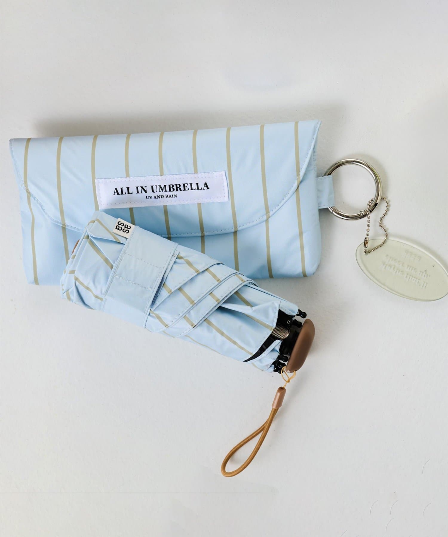 BIRTHDAY BAR(バースデイバー) 〈遮光・UVカット率100％〉ストライプ 晴雨兼用 折りたたみ傘 ポーチ付き