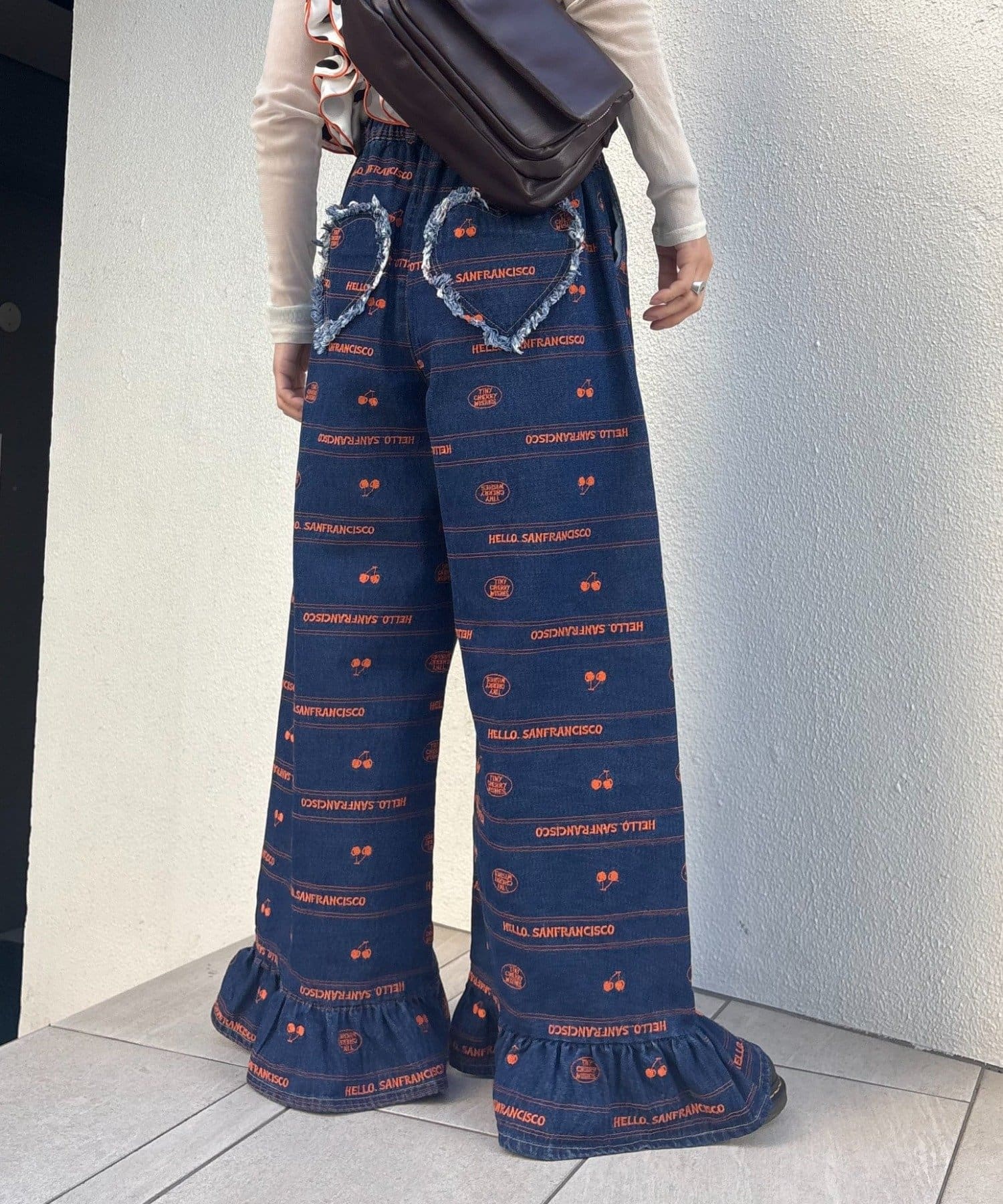 CIAOPANIC TYPY(チャオパニックティピー) 【HELLO.SANFRANCISCO/ハローサンフランシスコ】裾フリル総柄刺繍イージーワイドデニム