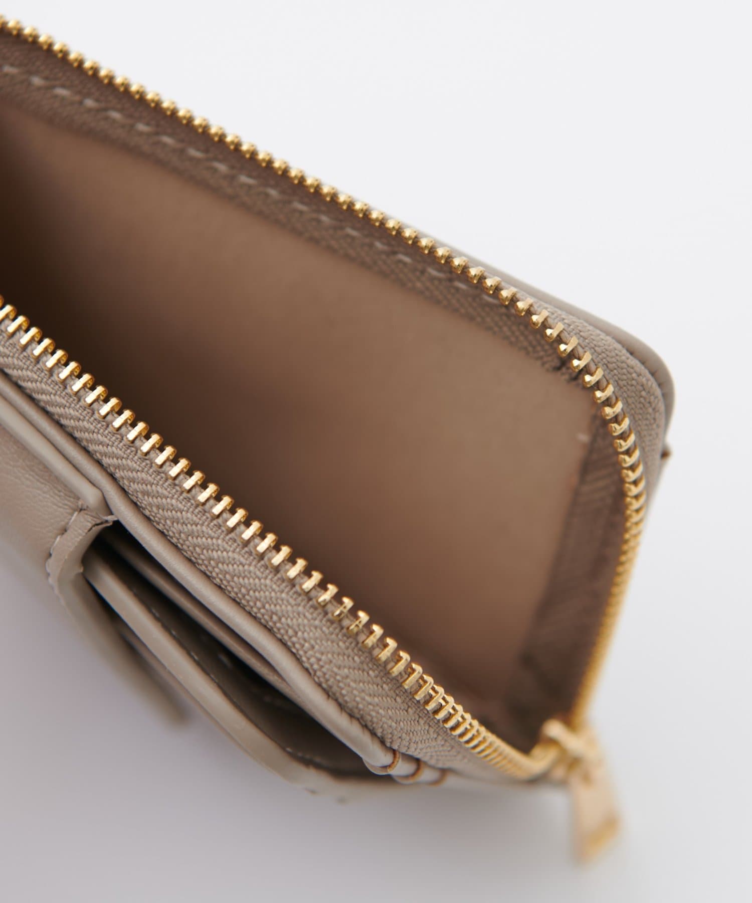 DISCOAT(ディスコート) Vキルティングフラグメントケース