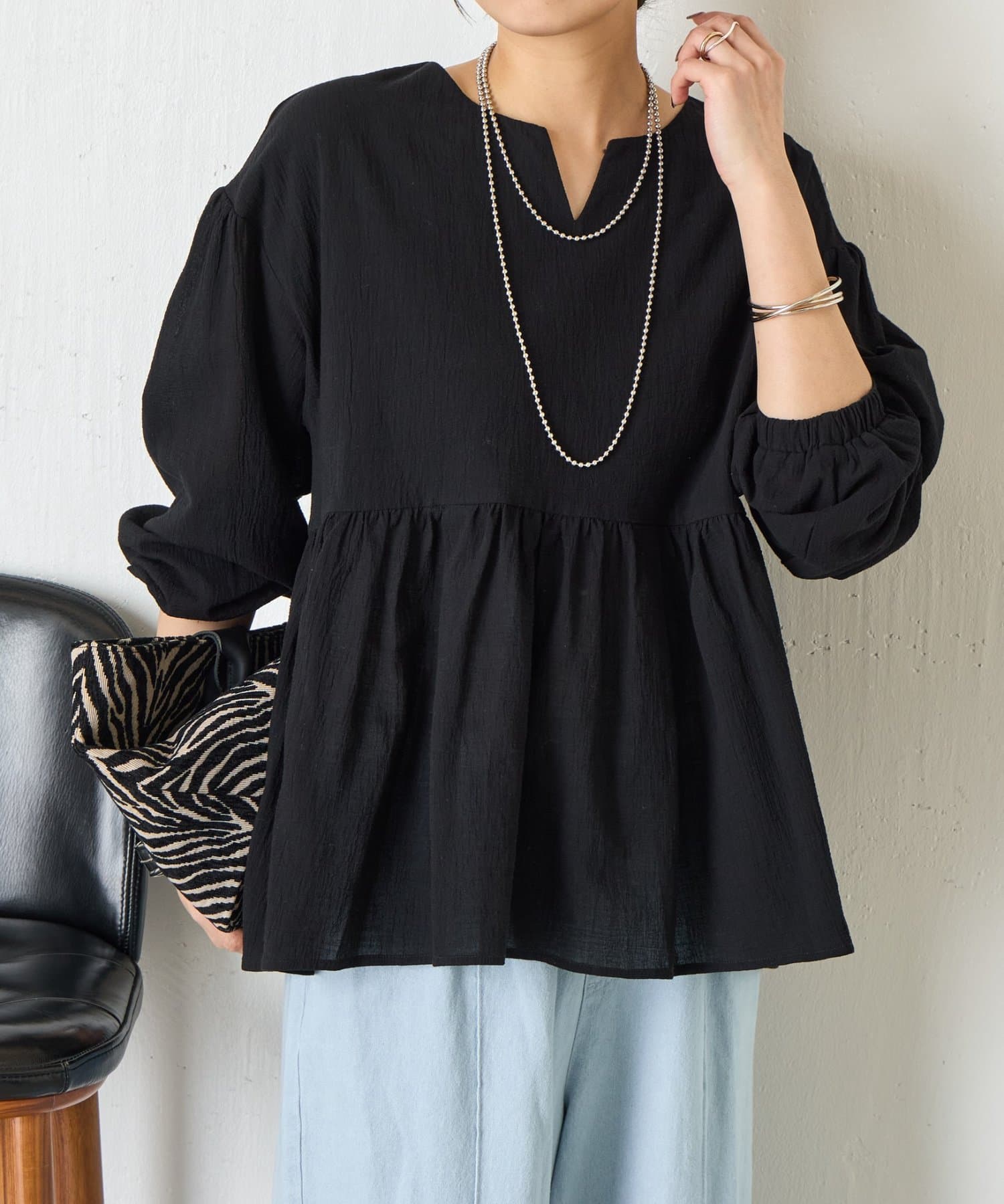 Jena　espace merveilleux(ジェナ　エスパスメルヴェイユ) ヨウリュウペプラムブラウス