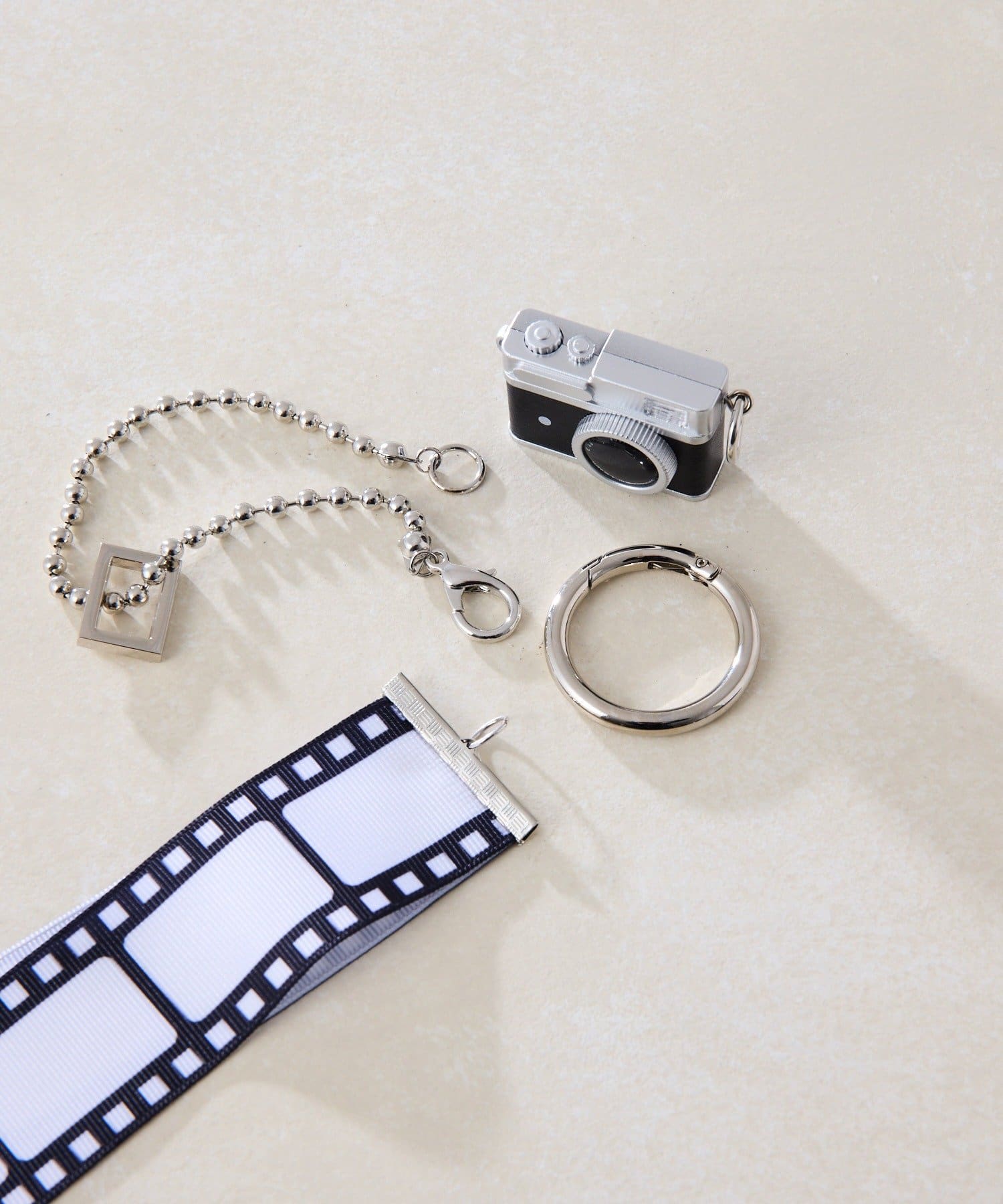 ear PAPILLONNER(イア パピヨネ) ネガフィルムストラップ/ チャーム