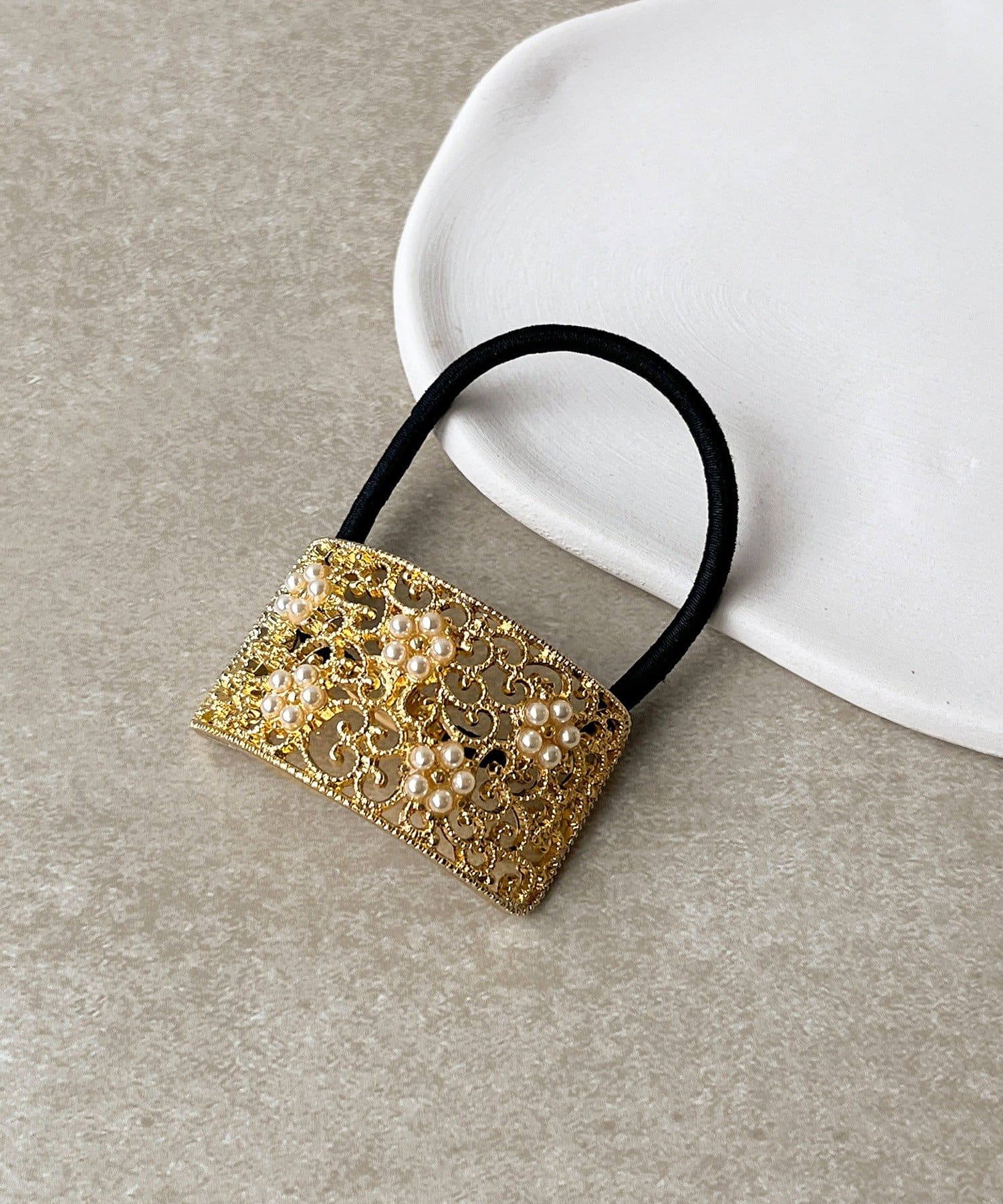 3COINS(スリーコインズ) パールスカシメタルポニー