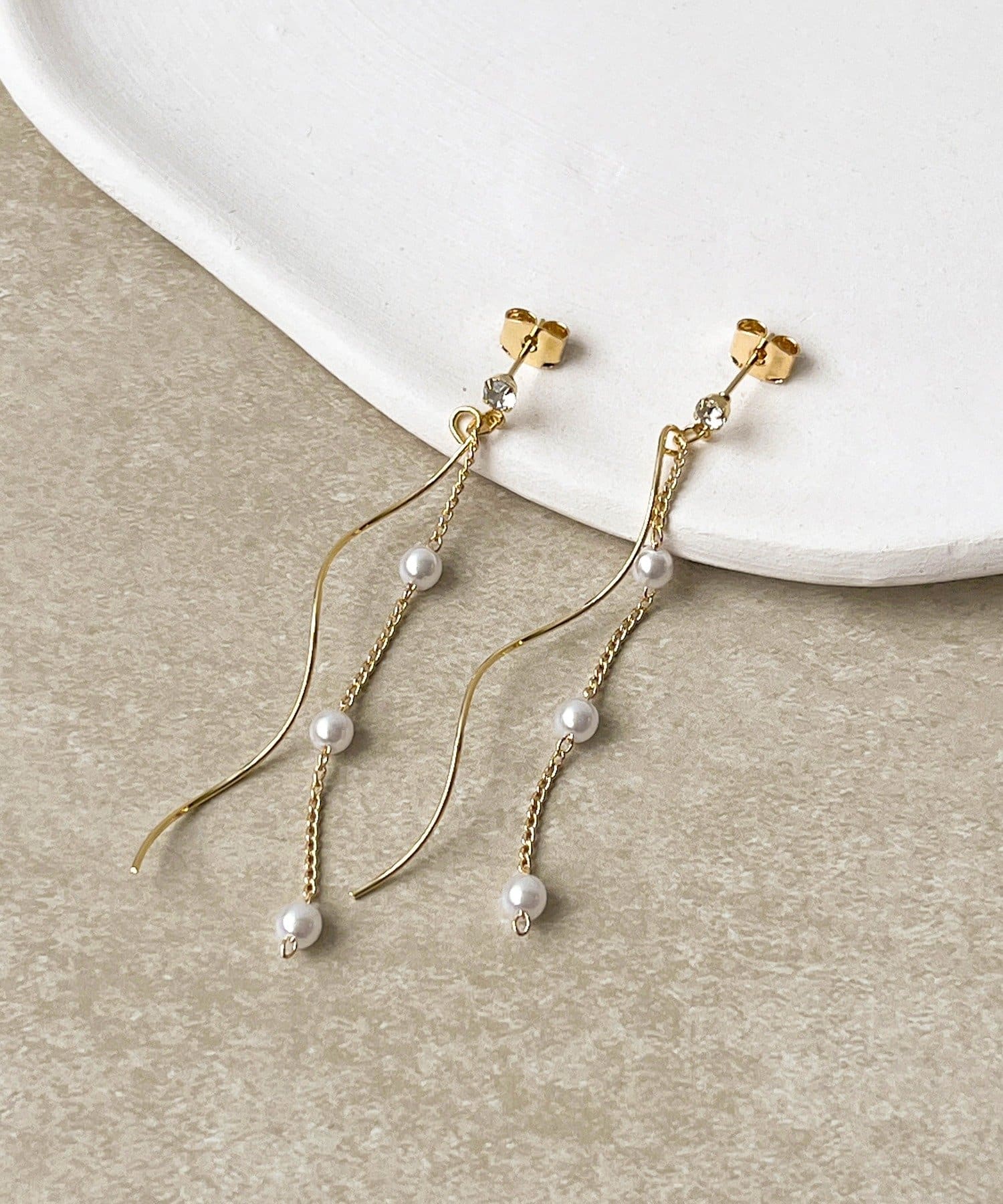 3COINS(スリーコインズ) スパイラルパールピアス