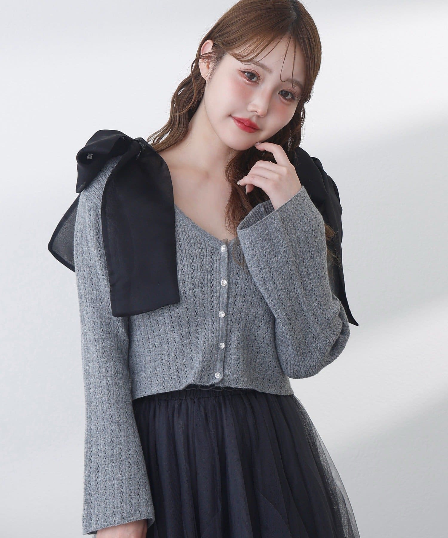 one after another NICE CLAUP(ワンアフターアナザー ナイスクラップ) キラキラボタンアイレットカーデ