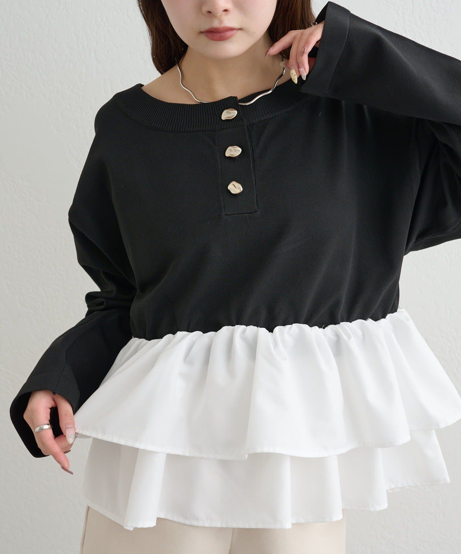 mystic(ミスティック) ペプラムヘンリーニット