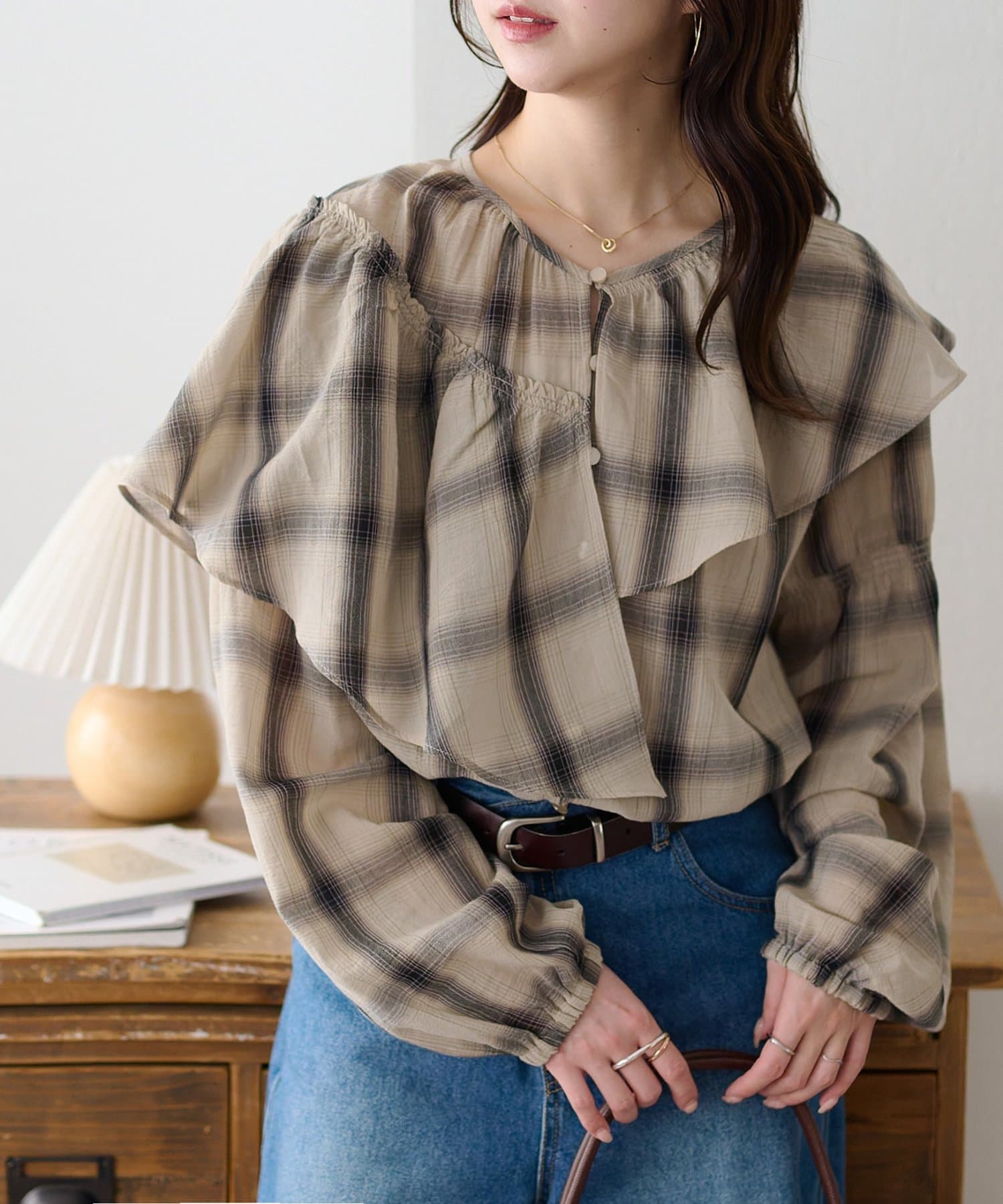 DISCOAT(ディスコート) シアーチェックアシメフリルブラウス