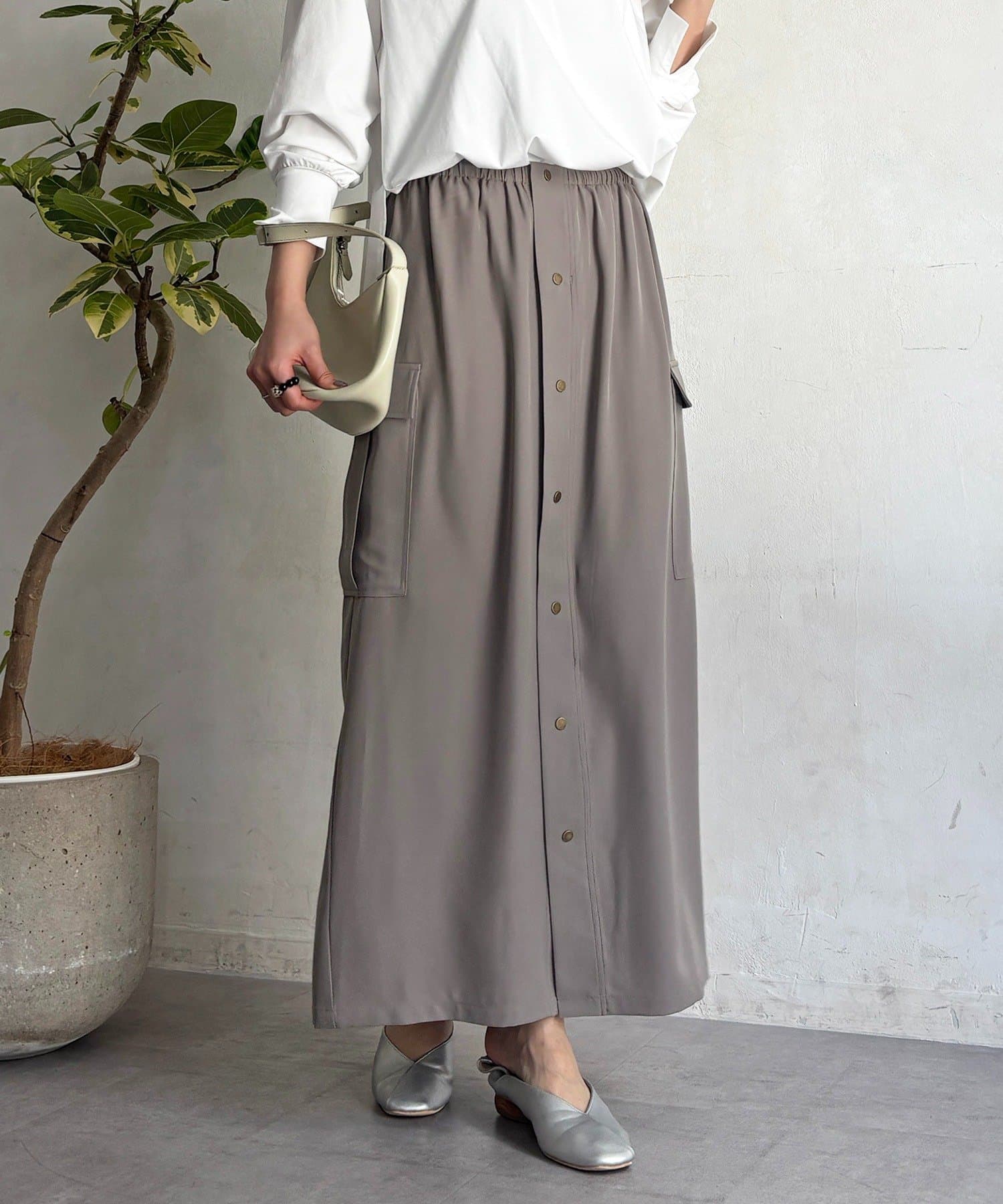 un dix cors(アンディコール) 前ボタンナロースカート