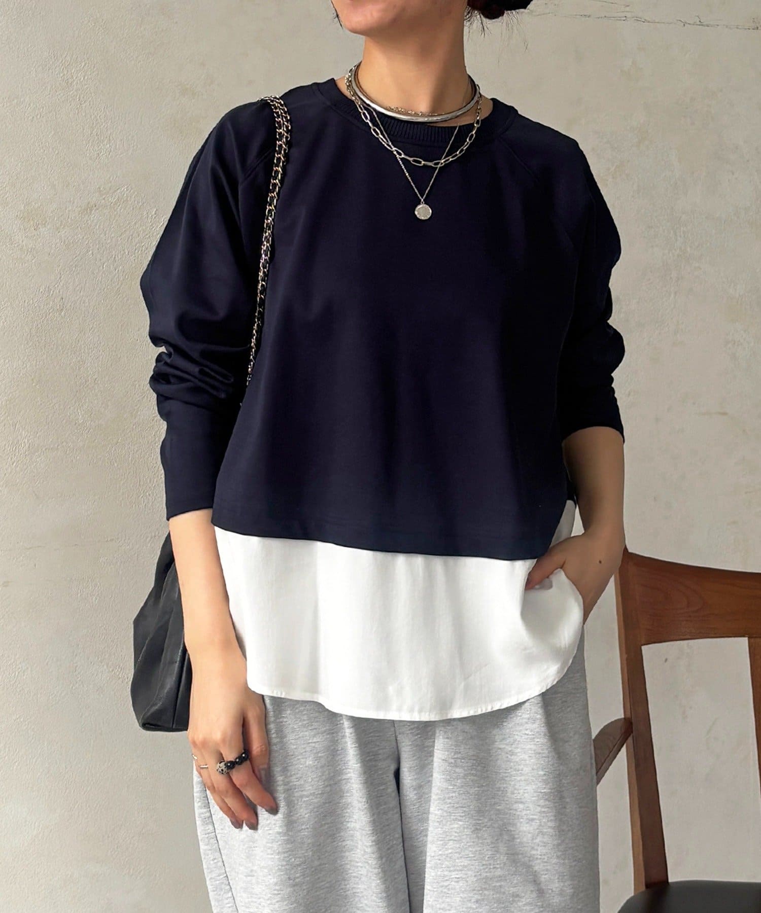 un dix cors(アンディコール) 異素材裾切り替プルオーバー