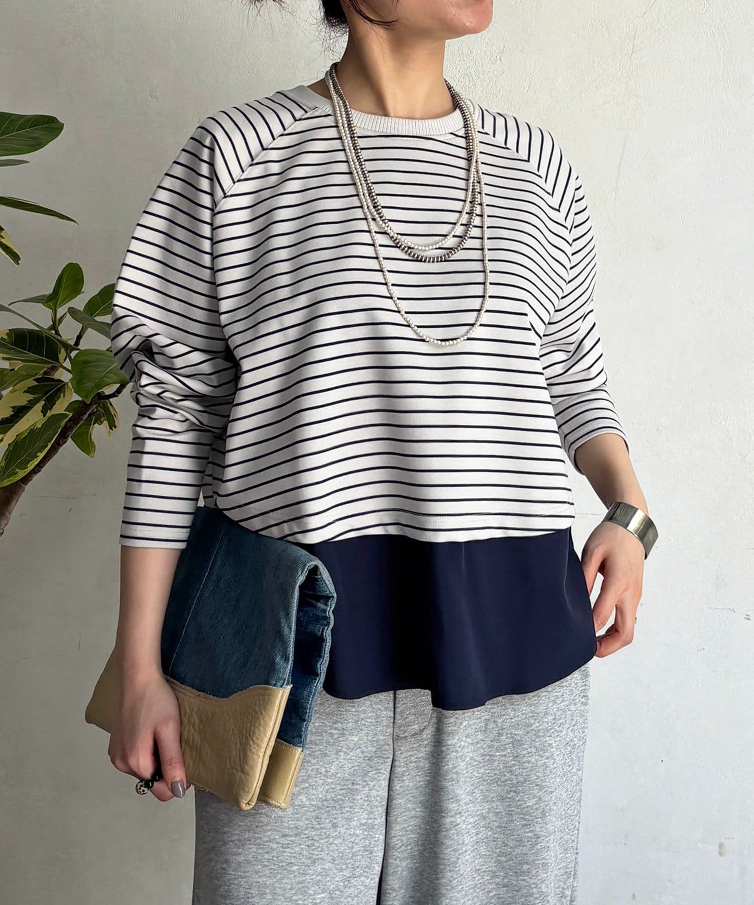 un dix cors(アンディコール) 異素材裾切り替プルオーバー