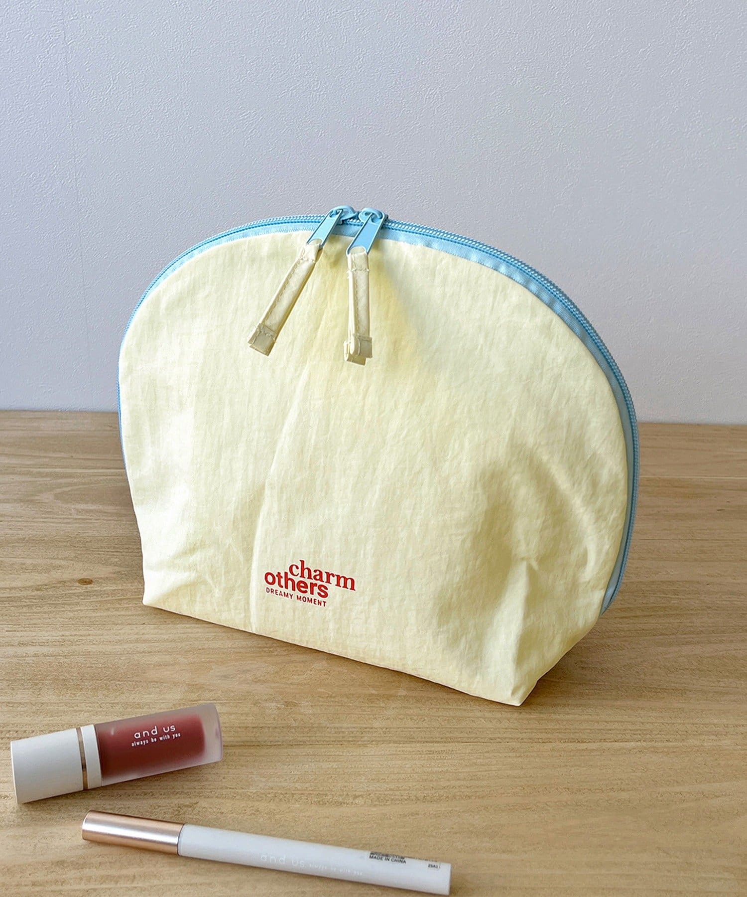 3COINS(スリーコインズ) 月型ポーチ