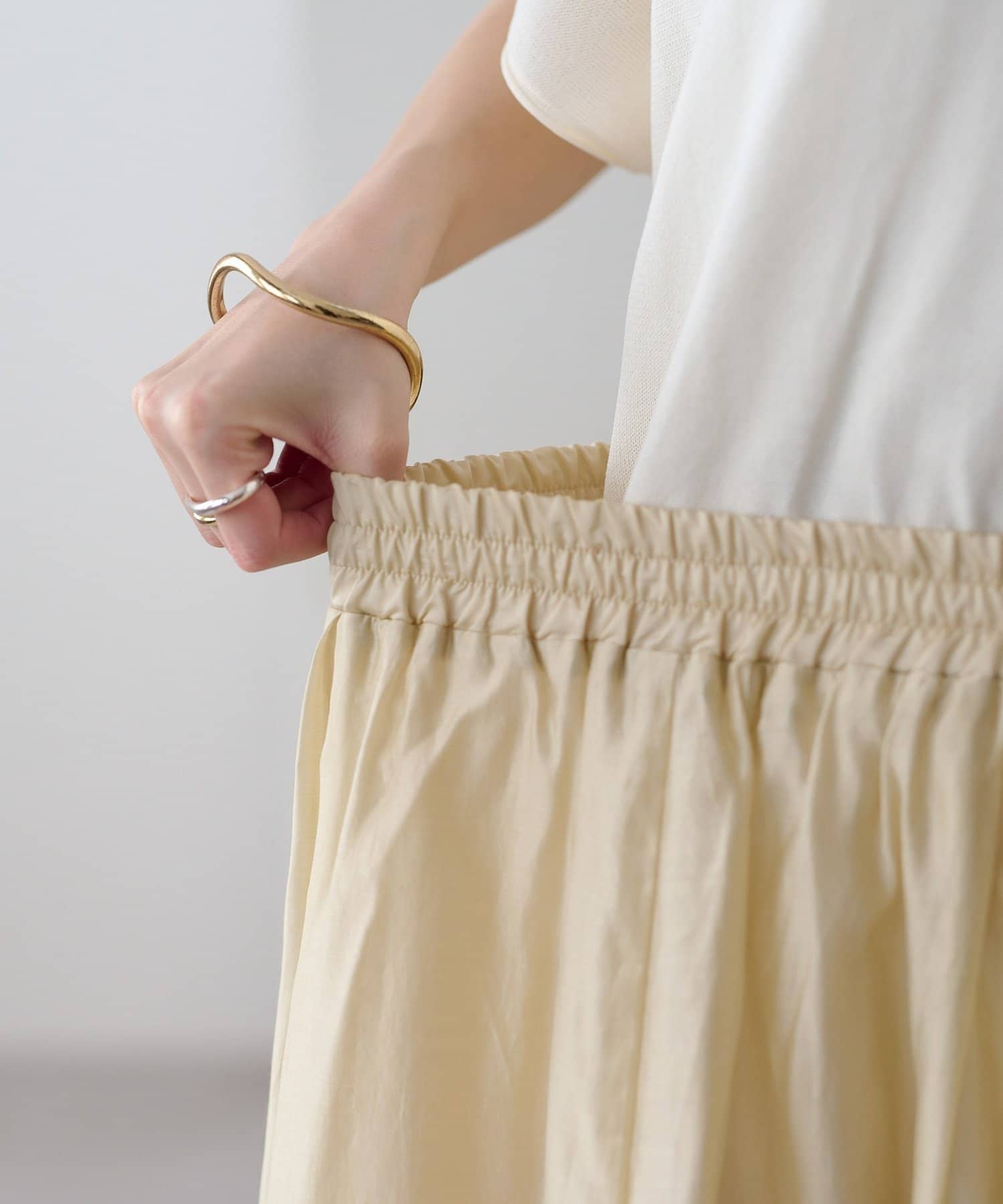 DISCOAT(ディスコート) シャイニーギャザーフレアスカート