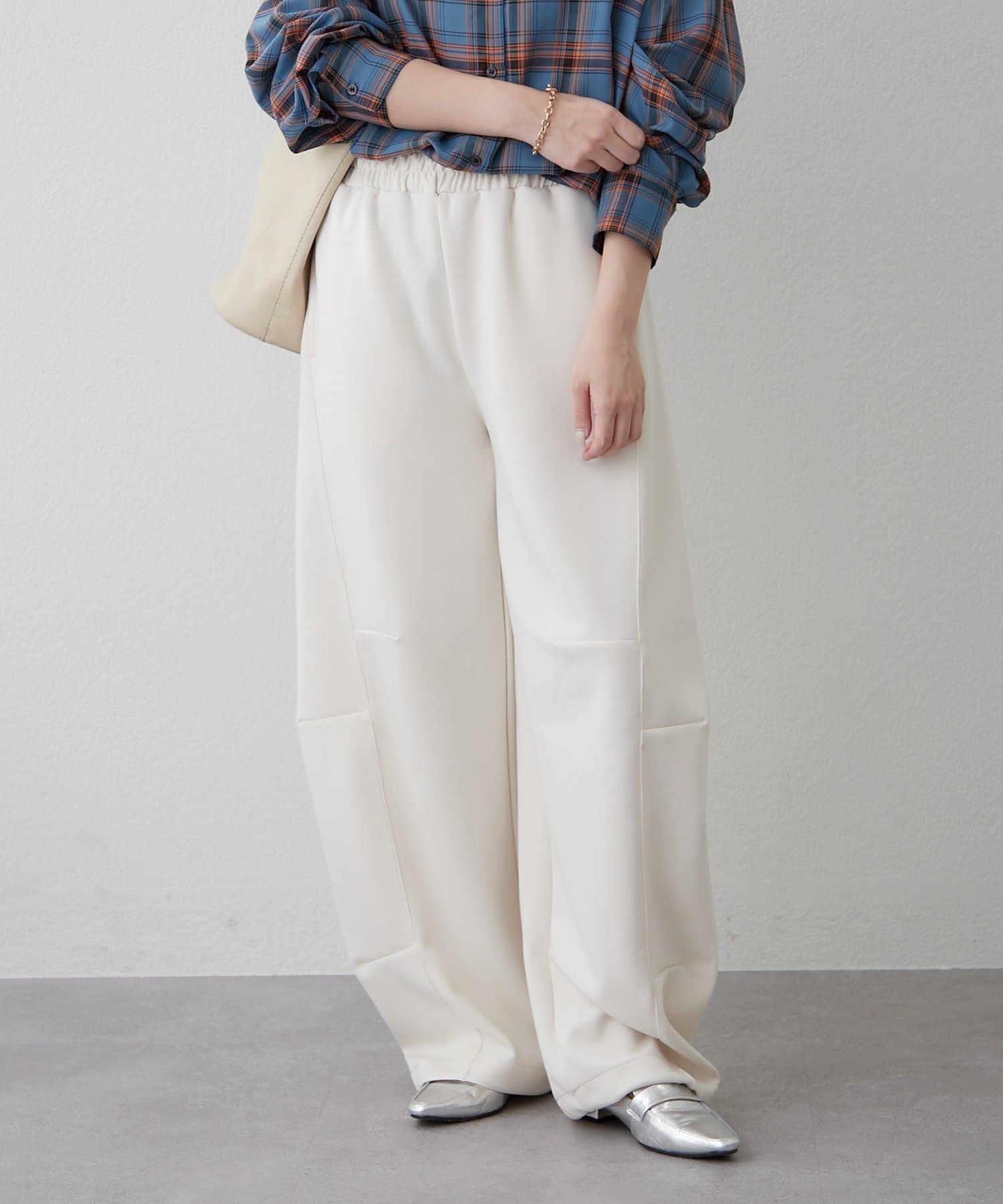 Remind me and forever(リマインドミーアンドフォーエバー) カーブシルエットスウェットパンツ