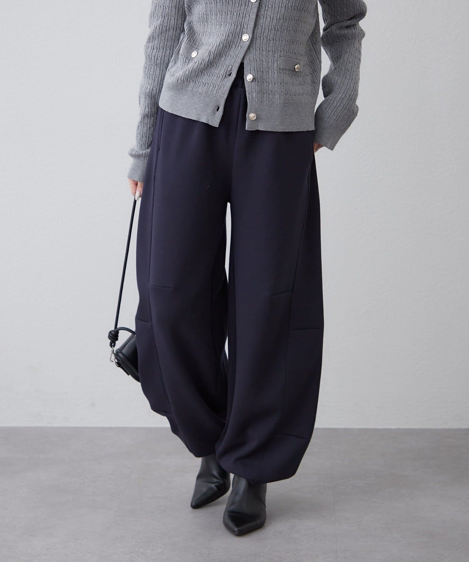 Remind me and forever(リマインドミーアンドフォーエバー) カーブシルエットスウェットパンツ