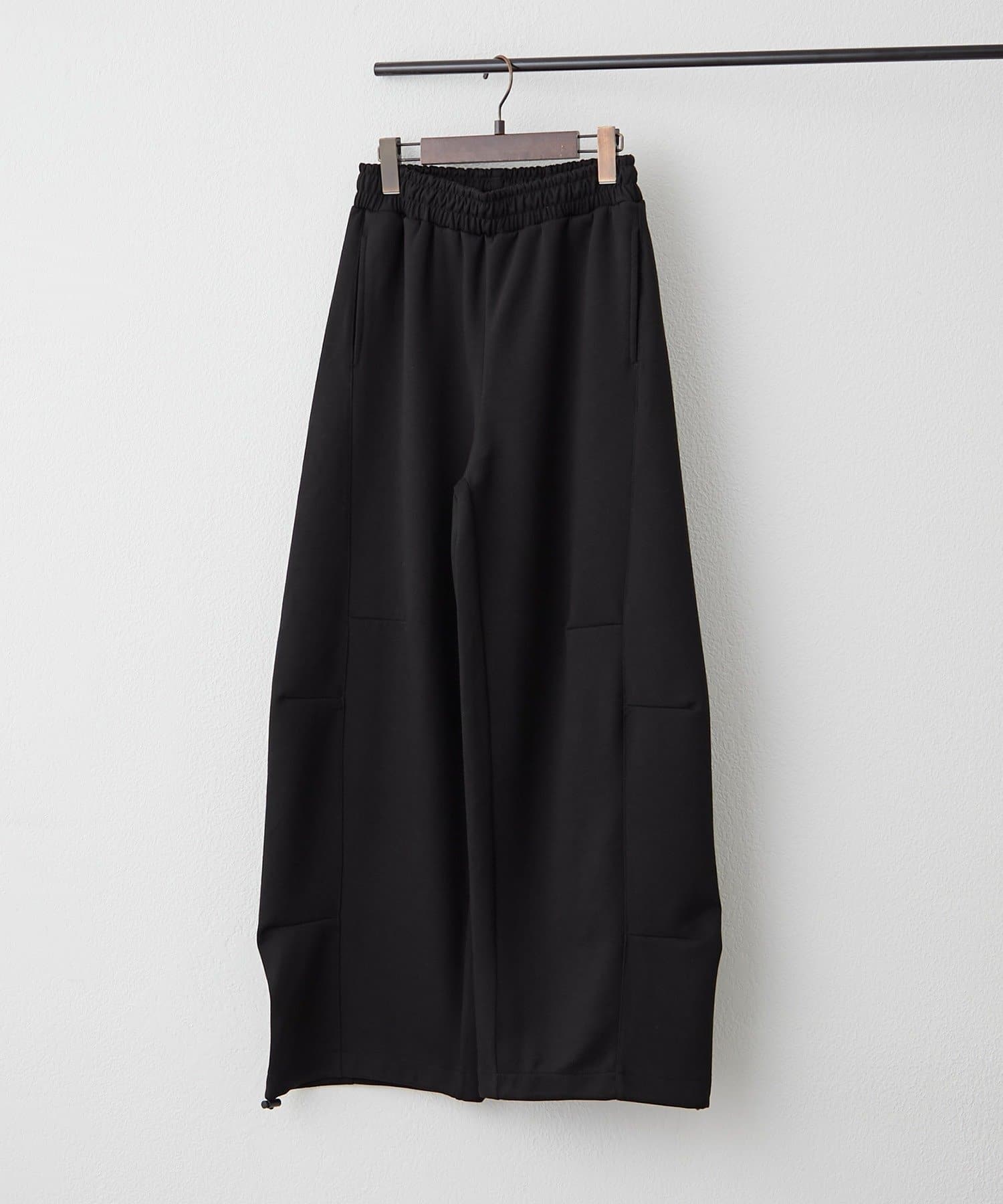 Remind me and forever(リマインドミーアンドフォーエバー) カーブシルエットスウェットパンツ