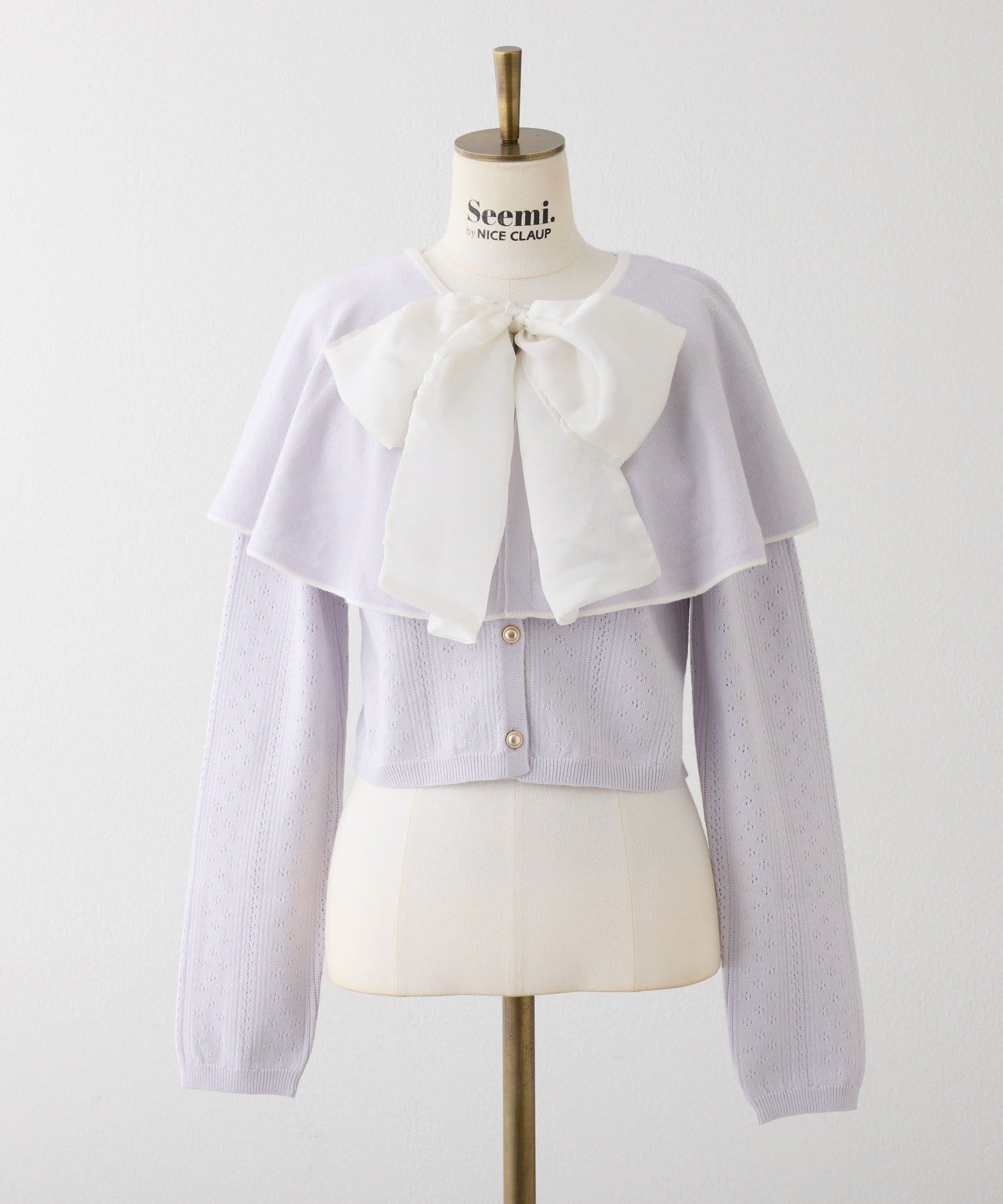 Seemi.by NICE CLAUP(シーミーバイナイスクラップ) 【ケープ取り外し可能】ボウタイアイレットカーディガン