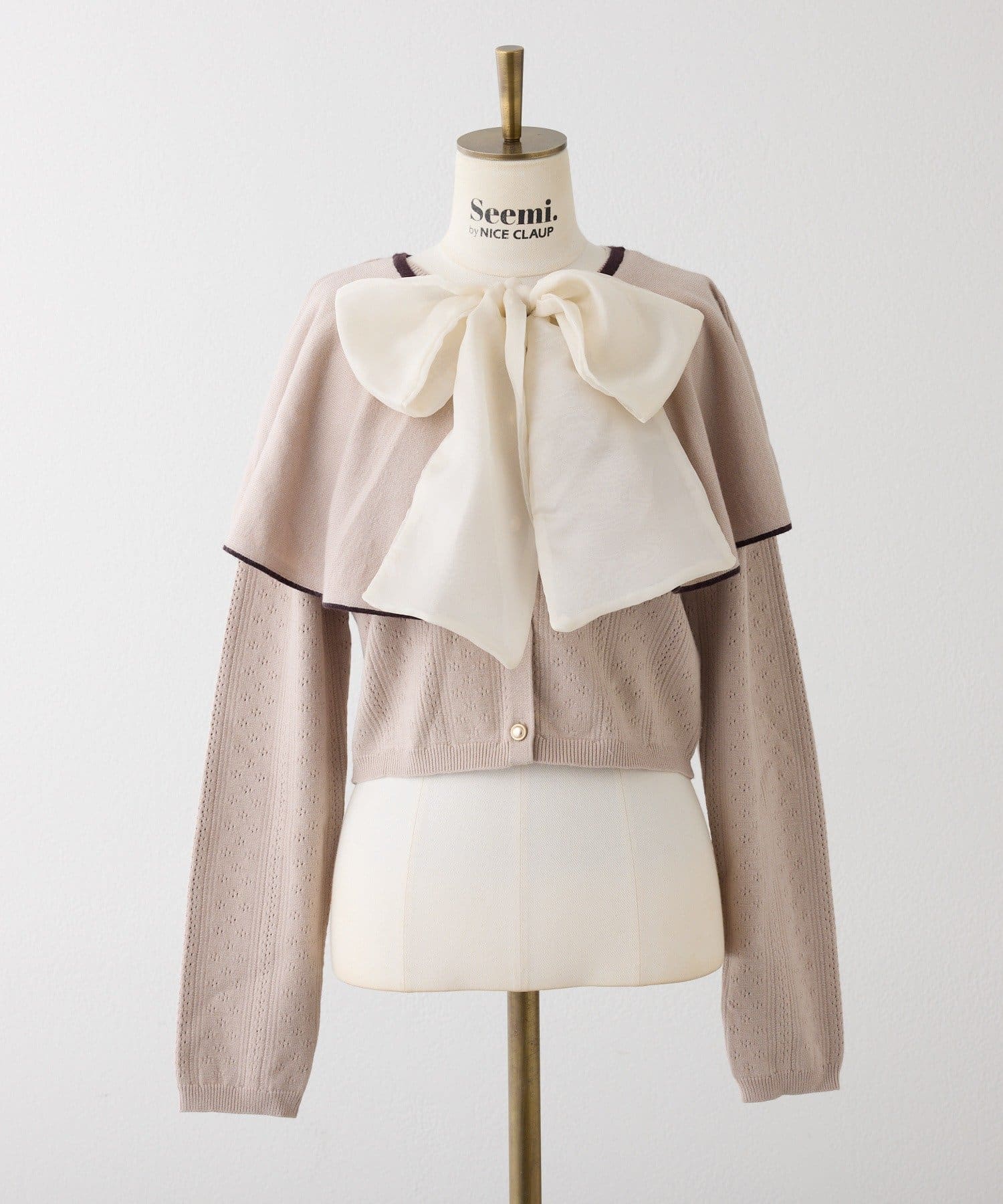 Seemi.by NICE CLAUP(シーミーバイナイスクラップ) 【ケープ取り外し可能】ボウタイアイレットカーディガン