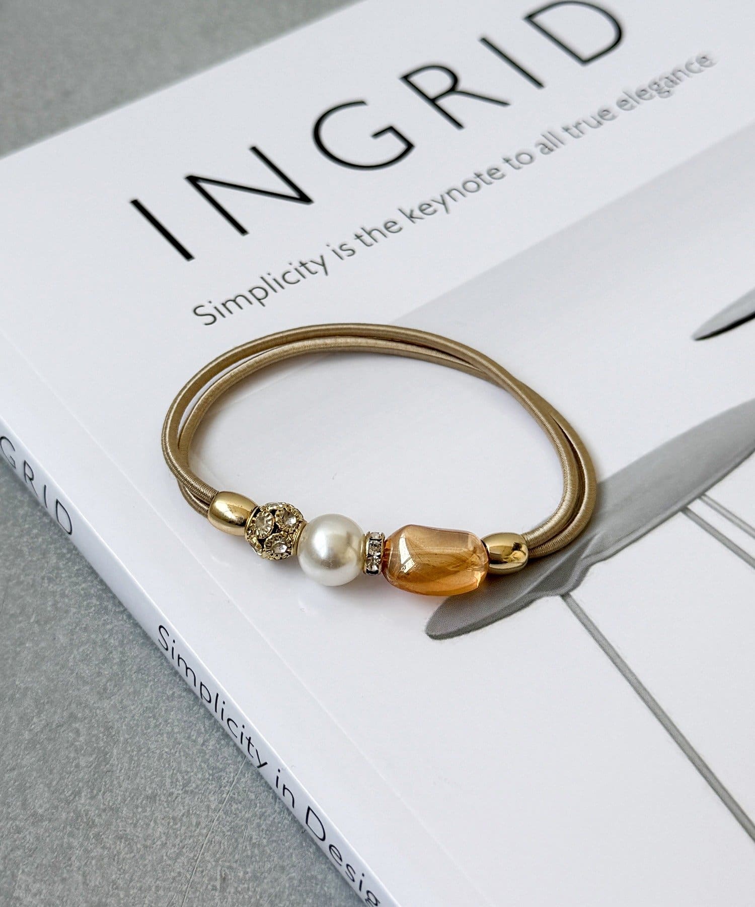 3COINS(スリーコインズ) イビツクリアビーズポニー