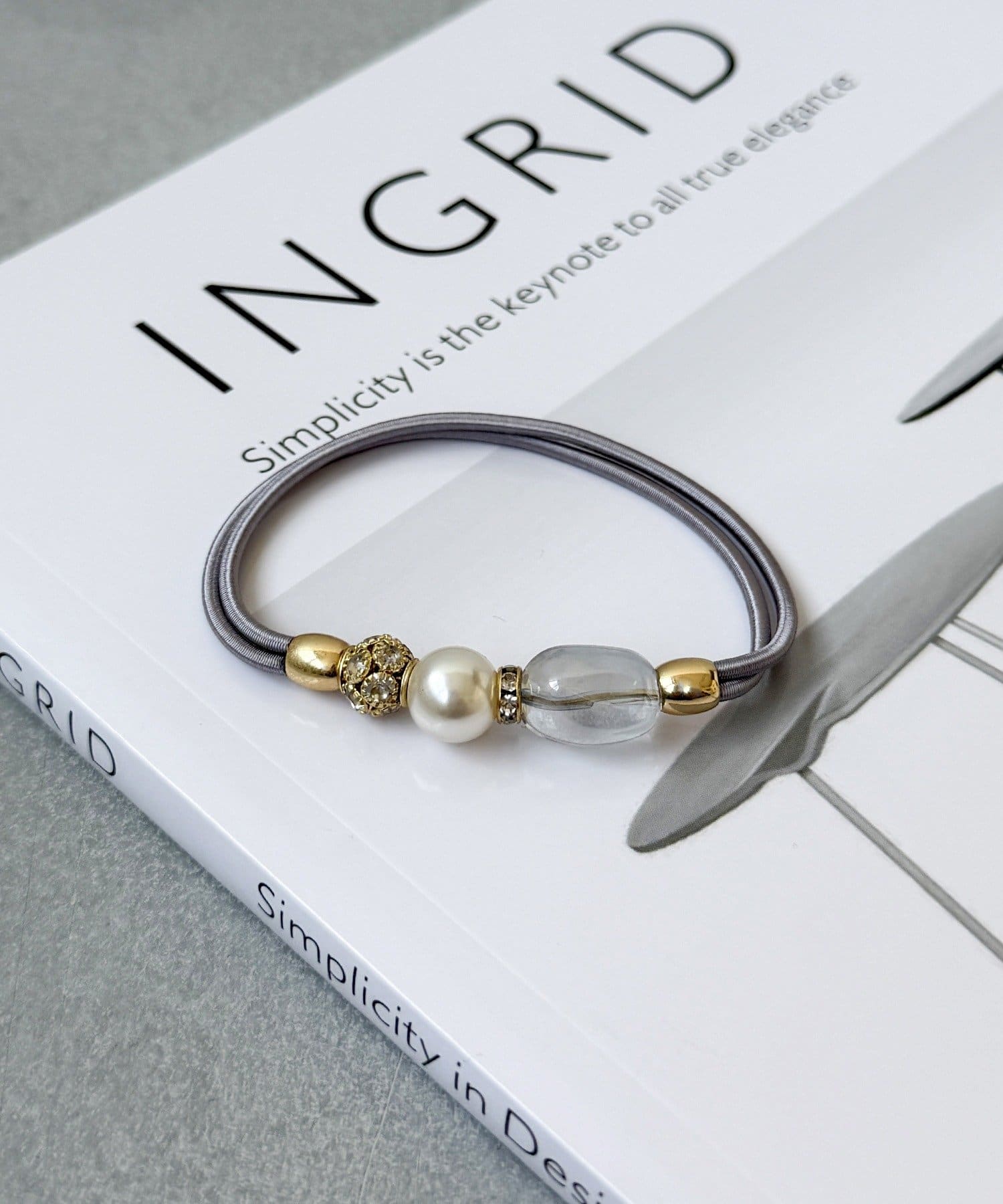 3COINS(スリーコインズ) イビツクリアビーズポニー