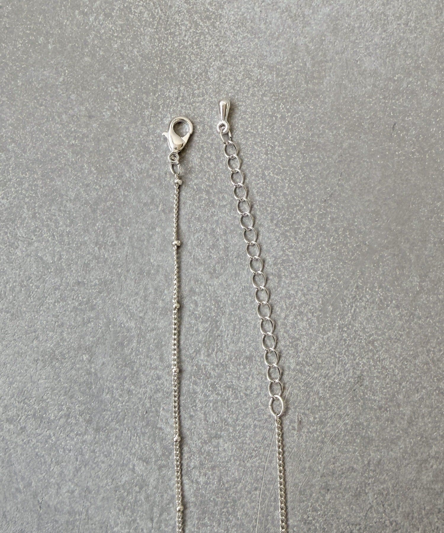 3COINS(スリーコインズ) ツートーンメタルショートネックレス