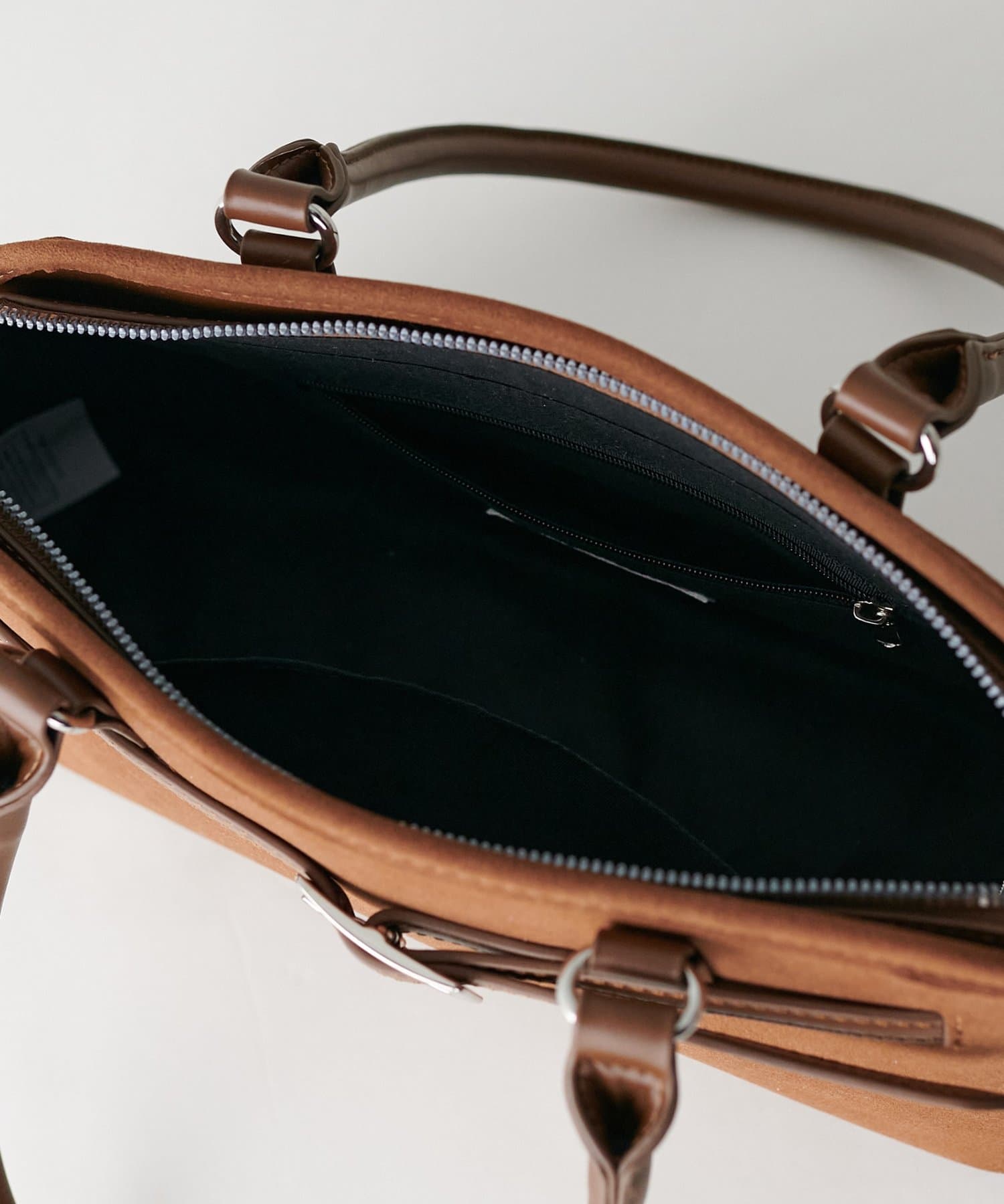 DISCOAT(ディスコート) ベルト使いコンビバッグ