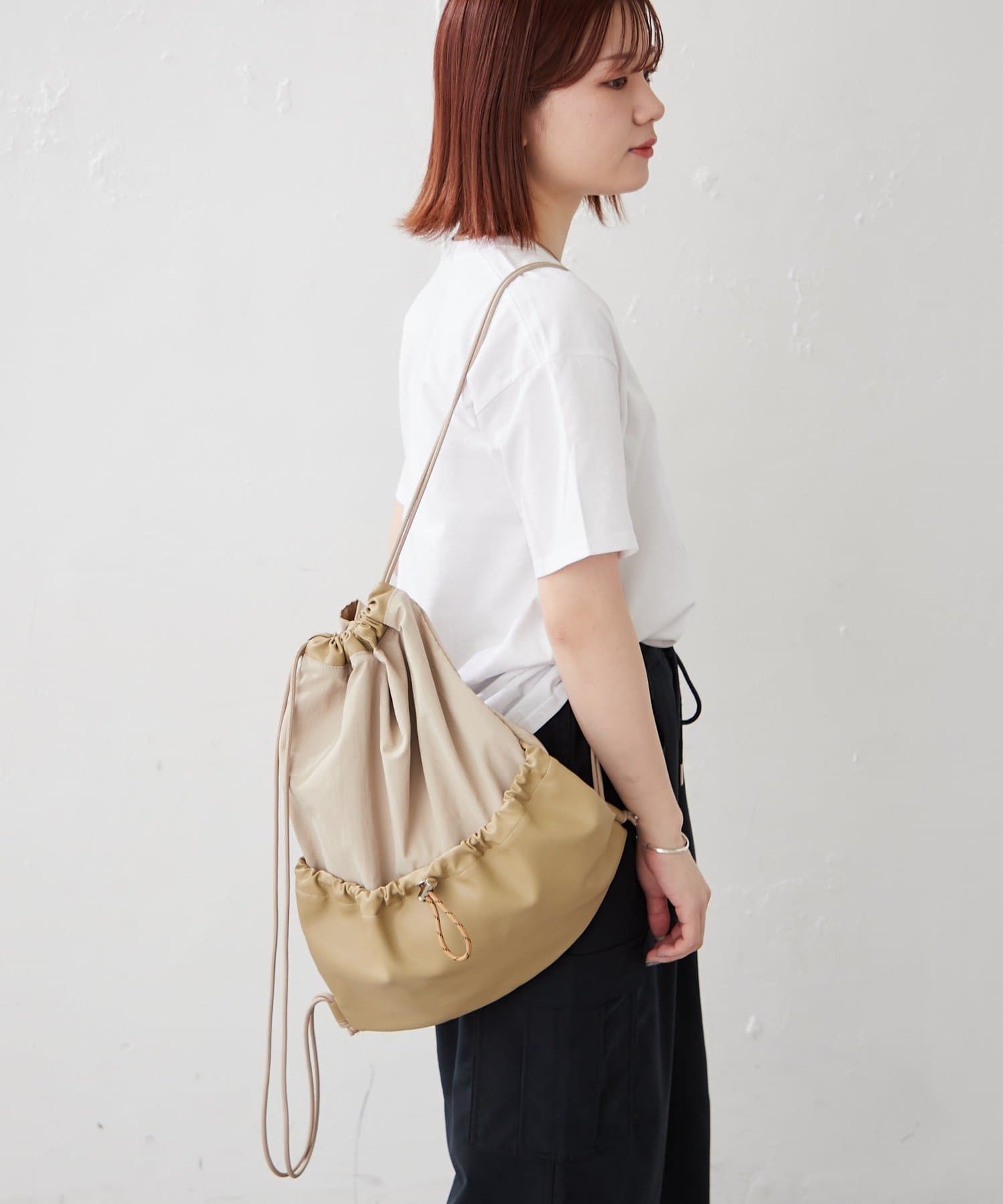 BIRTHDAY BAR(バースデイバー) 撥水ナイロン×フェイクレザーサックバッグ