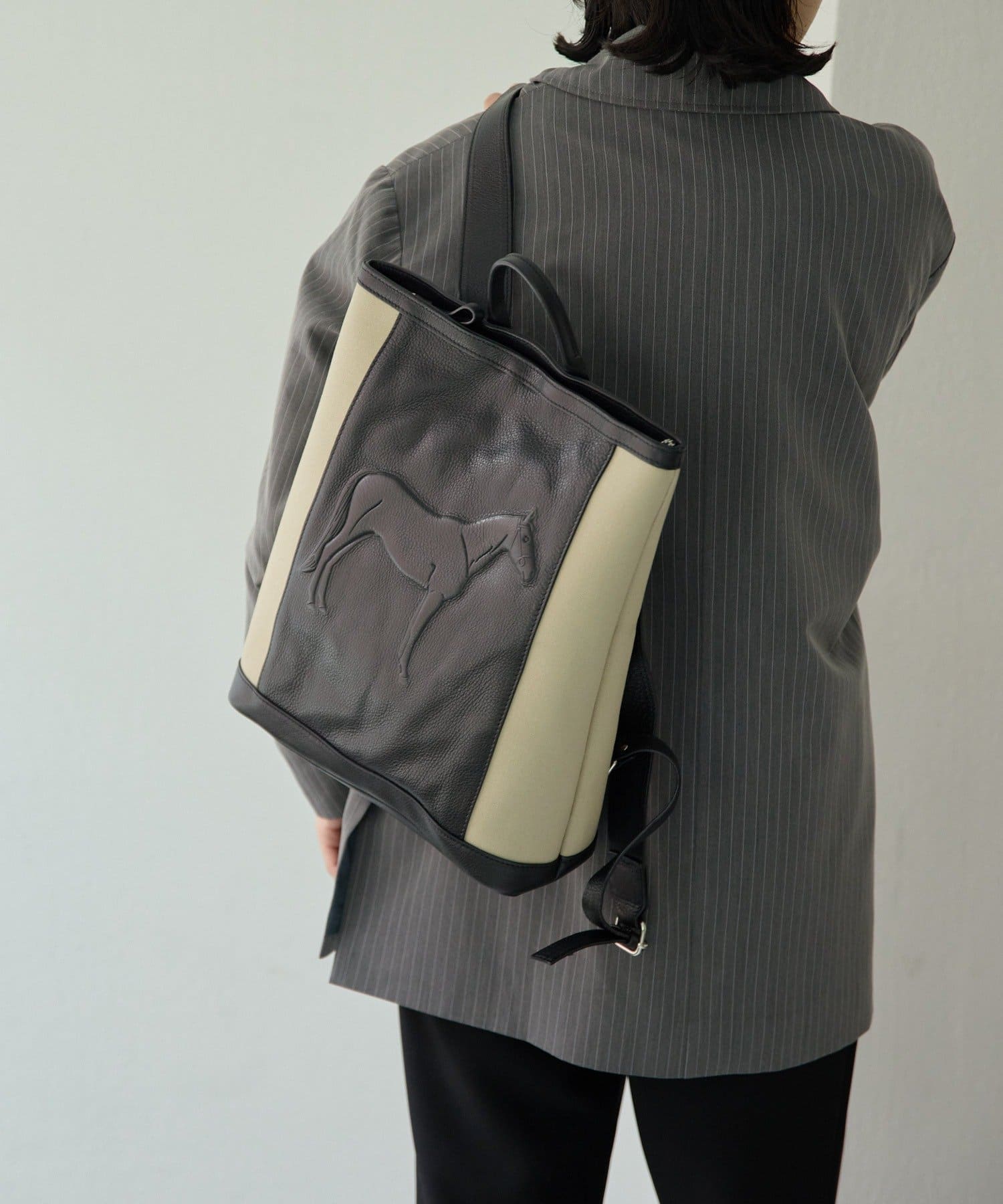 ear PAPILLONNER(イア パピヨネ) 【IOPELLE(イオペレ)】ホーススタンプキャンバスリュック