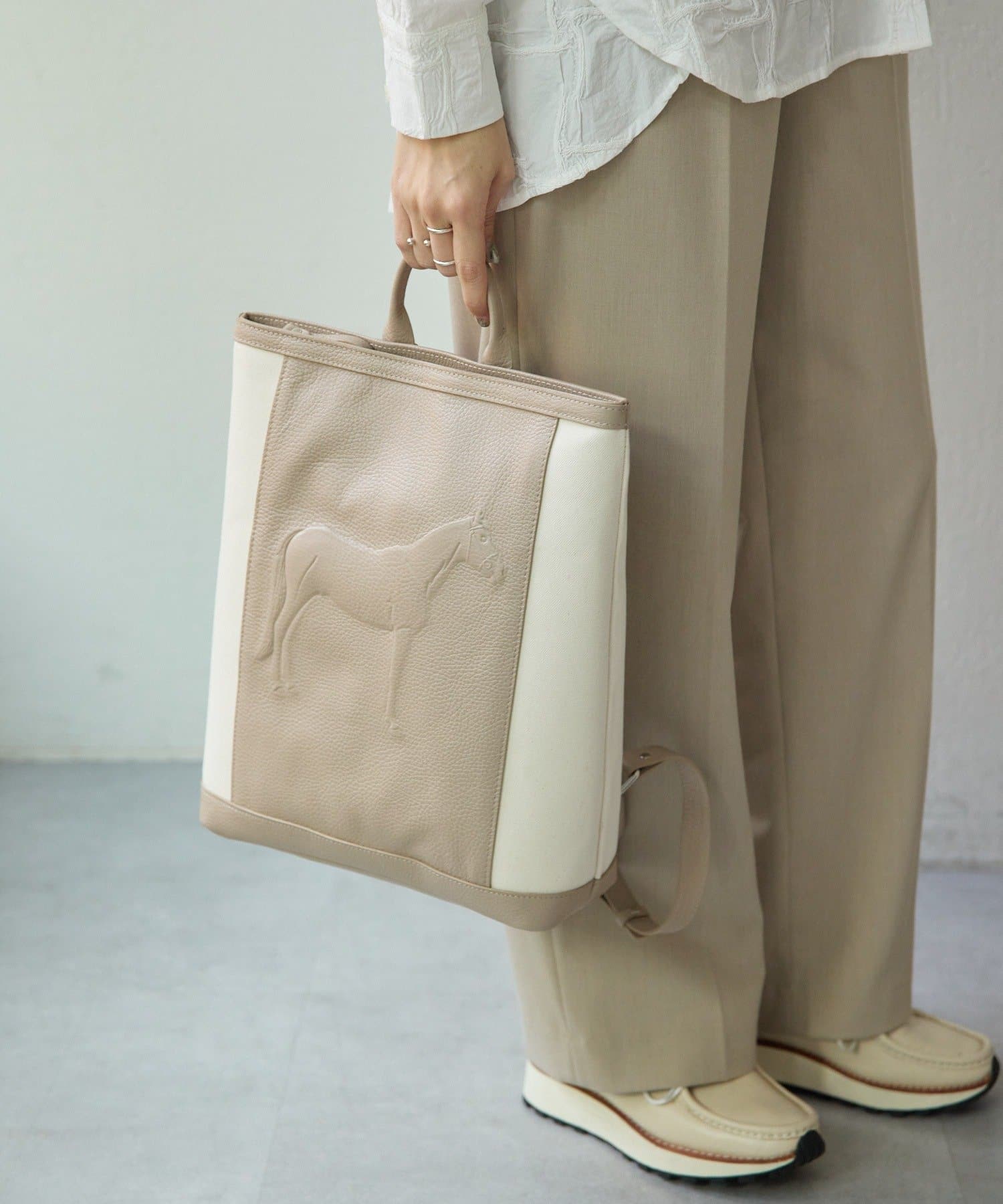 ear PAPILLONNER(イア パピヨネ) 【IOPELLE(イオペレ)】ホーススタンプキャンバスリュック