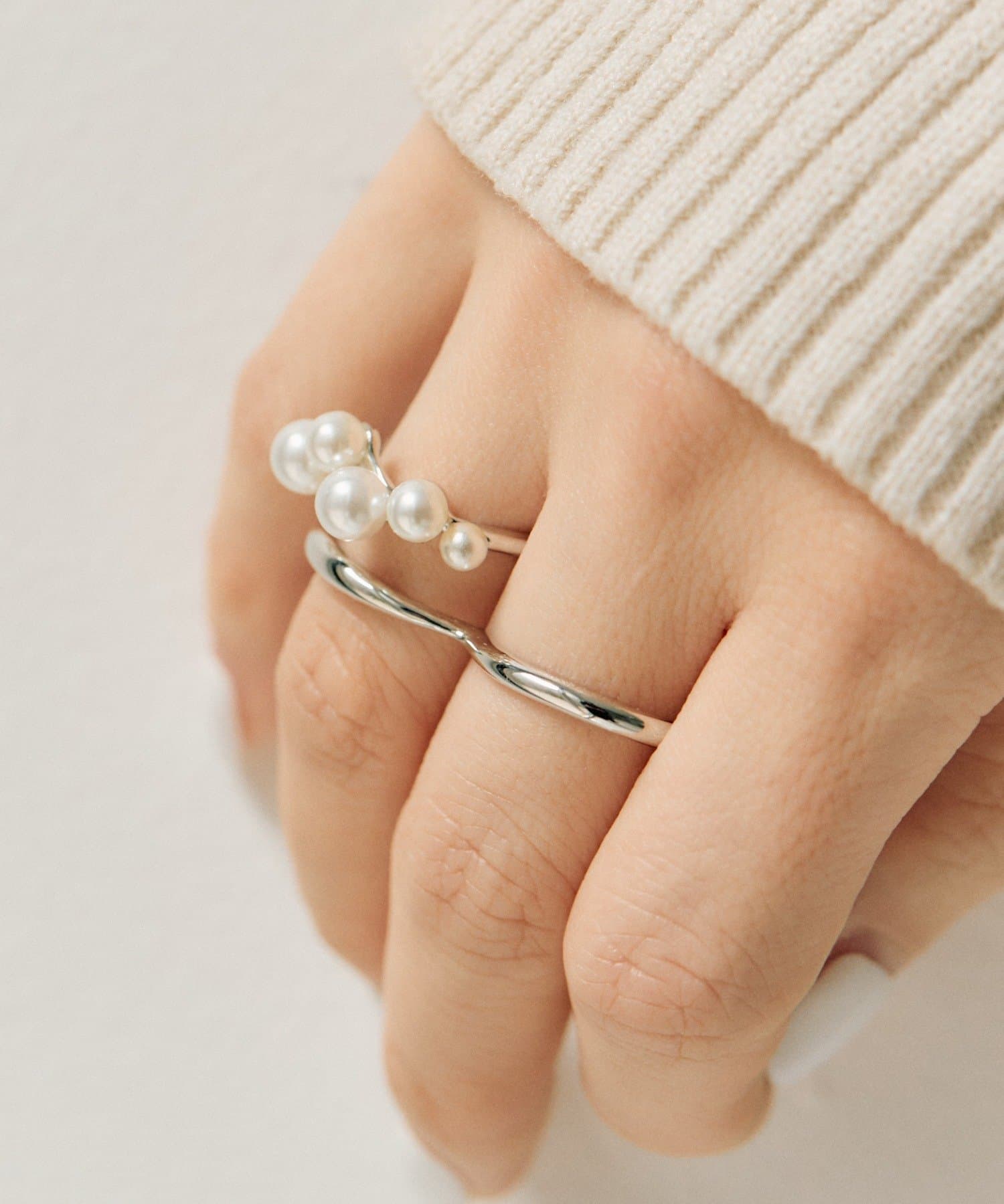 ear PAPILLONNER(イア パピヨネ) パール付ダブルリング