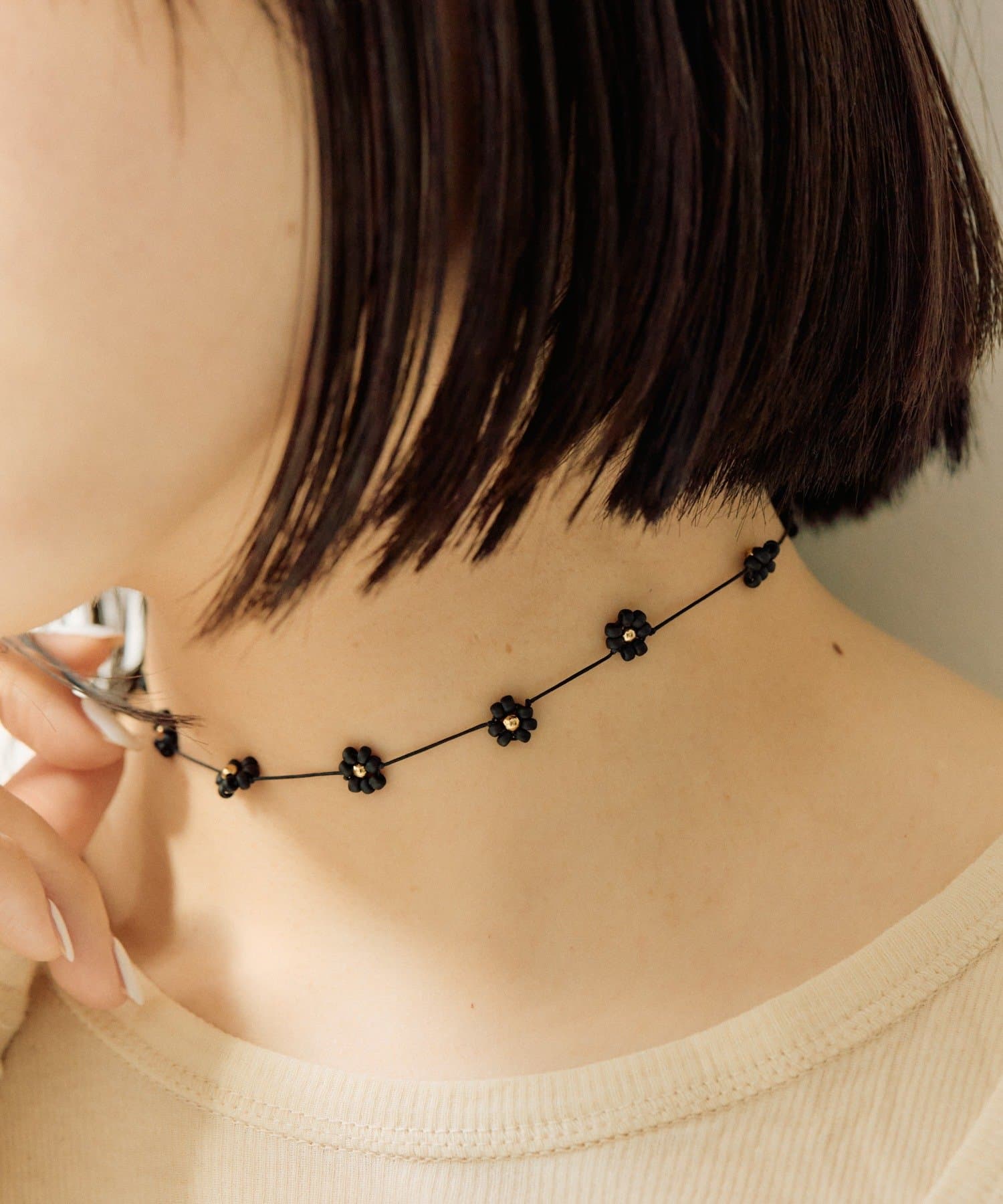 ear PAPILLONNER(イア パピヨネ) ビーズフラワースライドネックレス