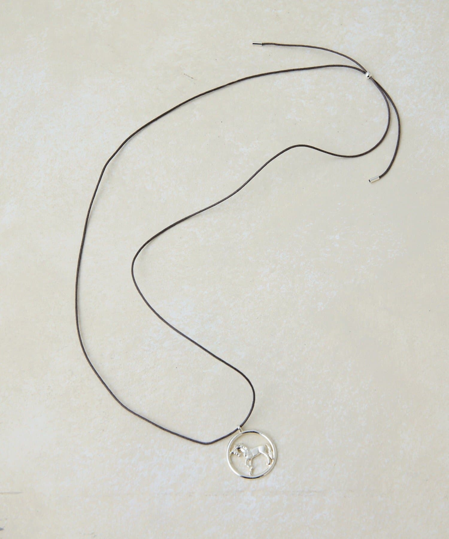 ear PAPILLONNER(イア パピヨネ) ホースエンブレムネックレス