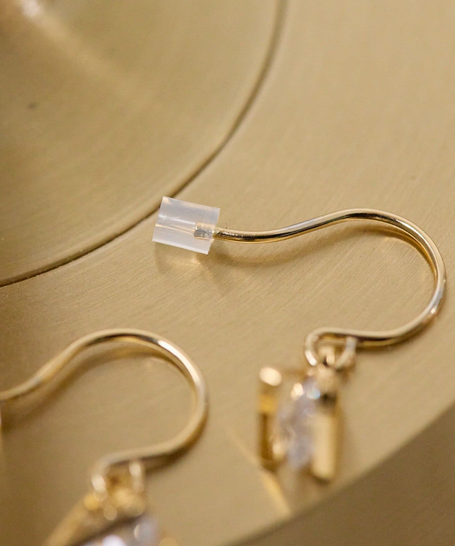 ear PAPILLONNER(イア パピヨネ) 三角×ジルコニアピアス