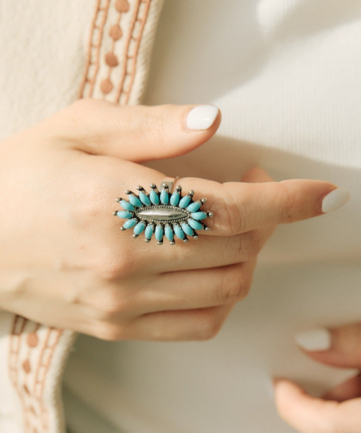 ear PAPILLONNER(イア パピヨネ) オーバルターコイズサンシャインリング