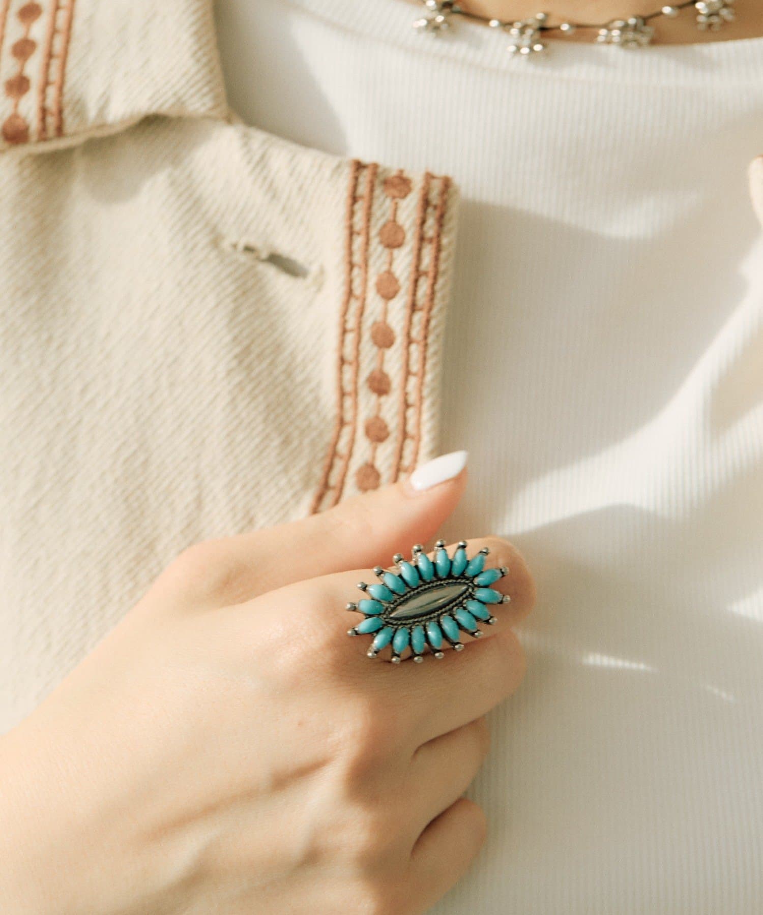 ear PAPILLONNER(イア パピヨネ) オーバルターコイズサンシャインリング