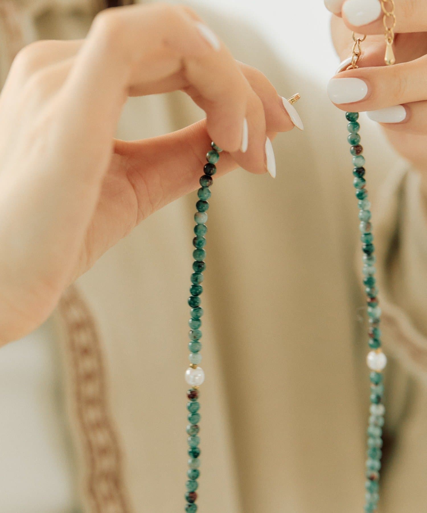 ear PAPILLONNER(イア パピヨネ) グリーンストーン×パールネックレス