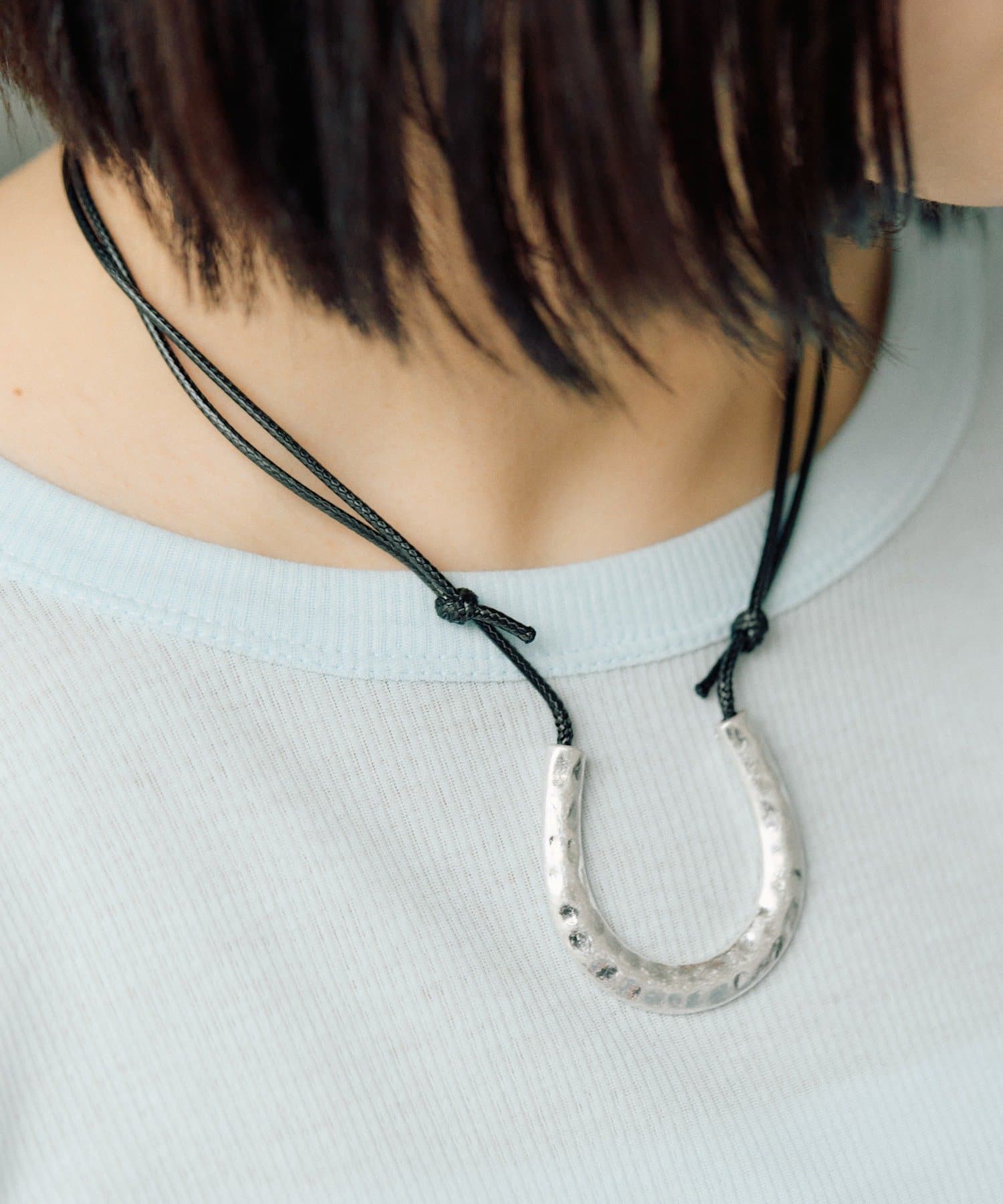 ear PAPILLONNER(イア パピヨネ) ホースシュースライドネックレス