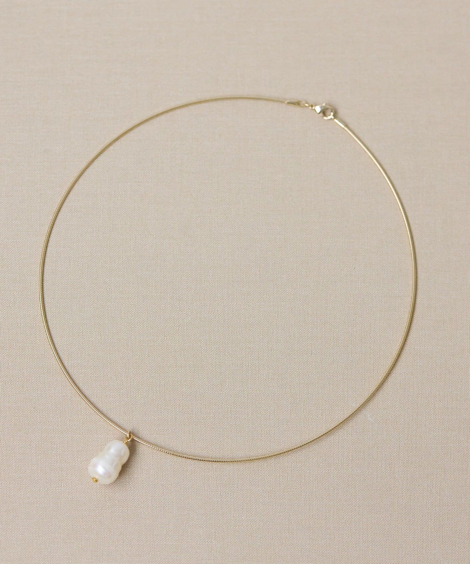 ear PAPILLONNER(イア パピヨネ) 《WEB＆一部店舗限定》雪だるまパールチョーカーネックレス