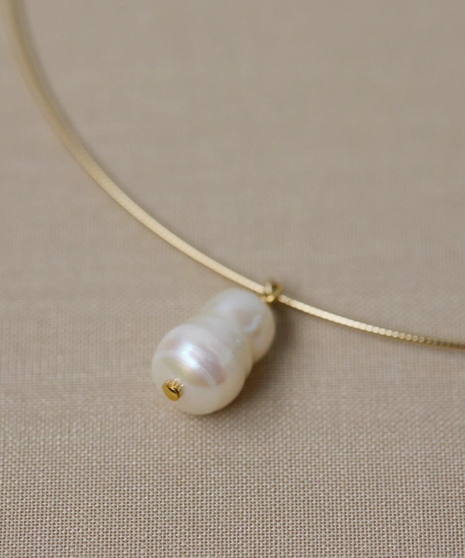 ear PAPILLONNER(イア パピヨネ) 《WEB＆一部店舗限定》雪だるまパールチョーカーネックレス