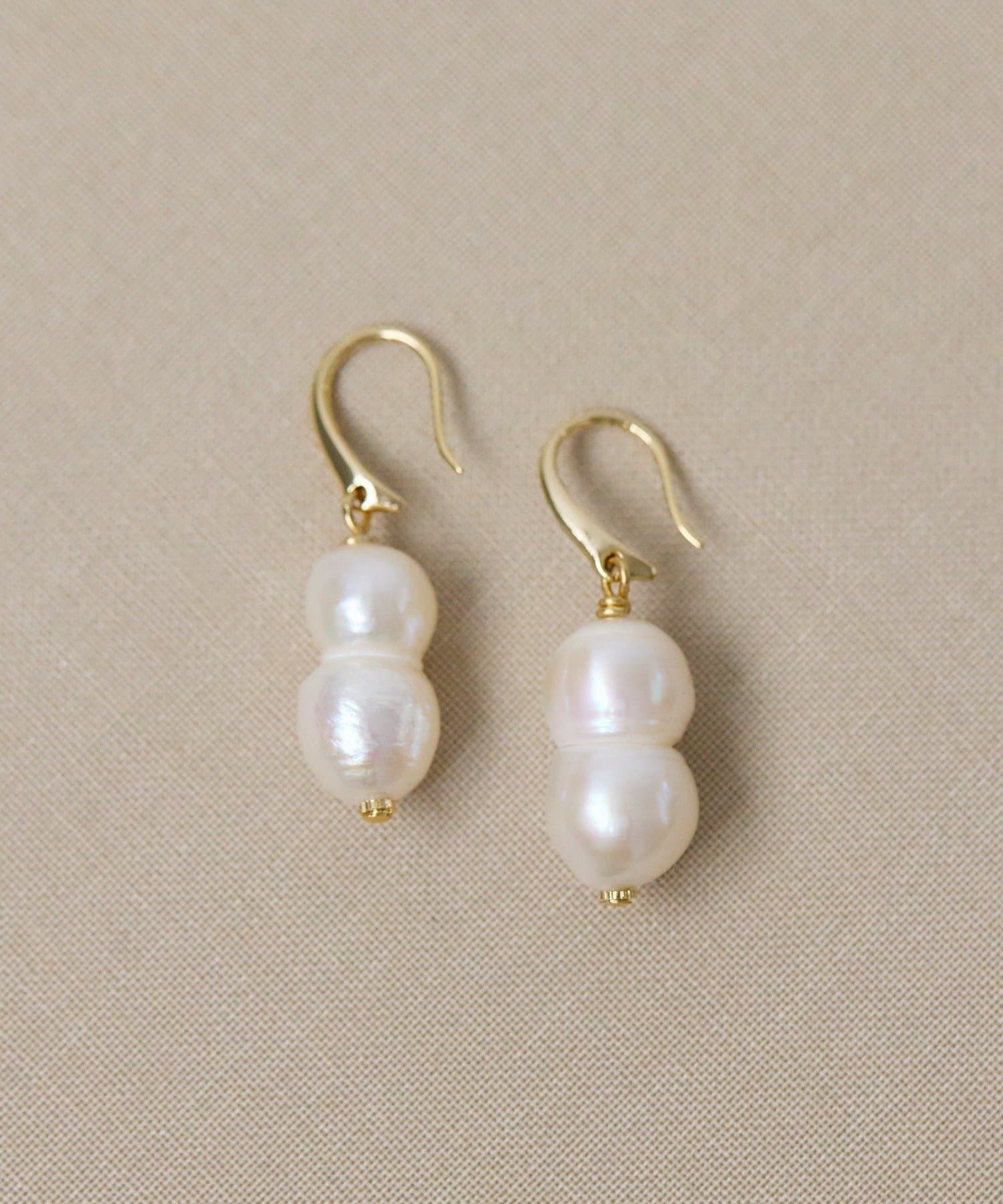 ear PAPILLONNER(イア パピヨネ) 《WEB＆一部店舗限定》雪だるまパールピアス