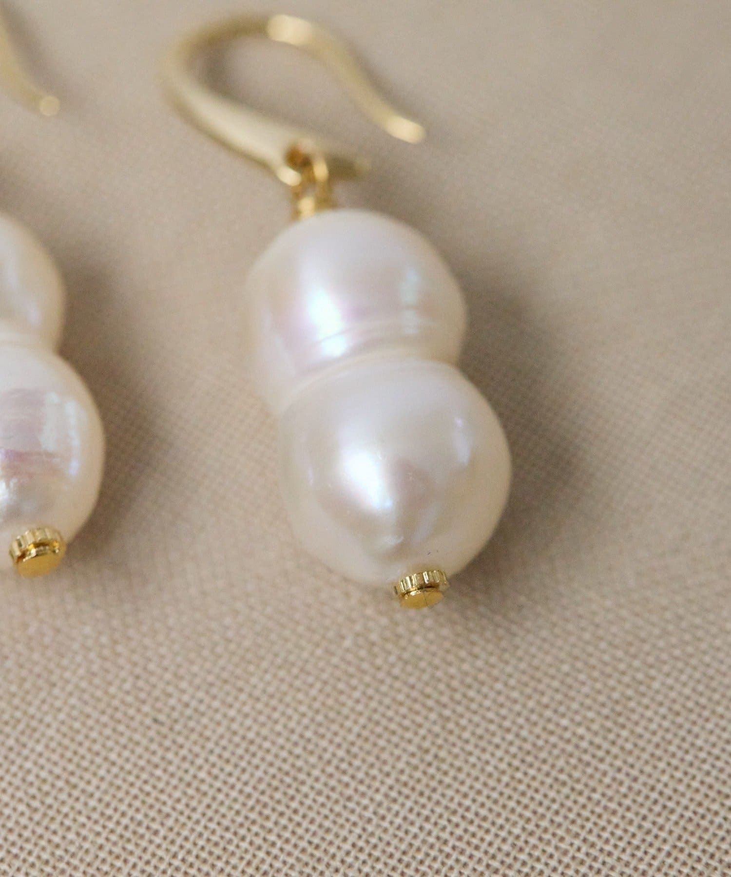 ear PAPILLONNER(イア パピヨネ) 《WEB＆一部店舗限定》雪だるまパールピアス